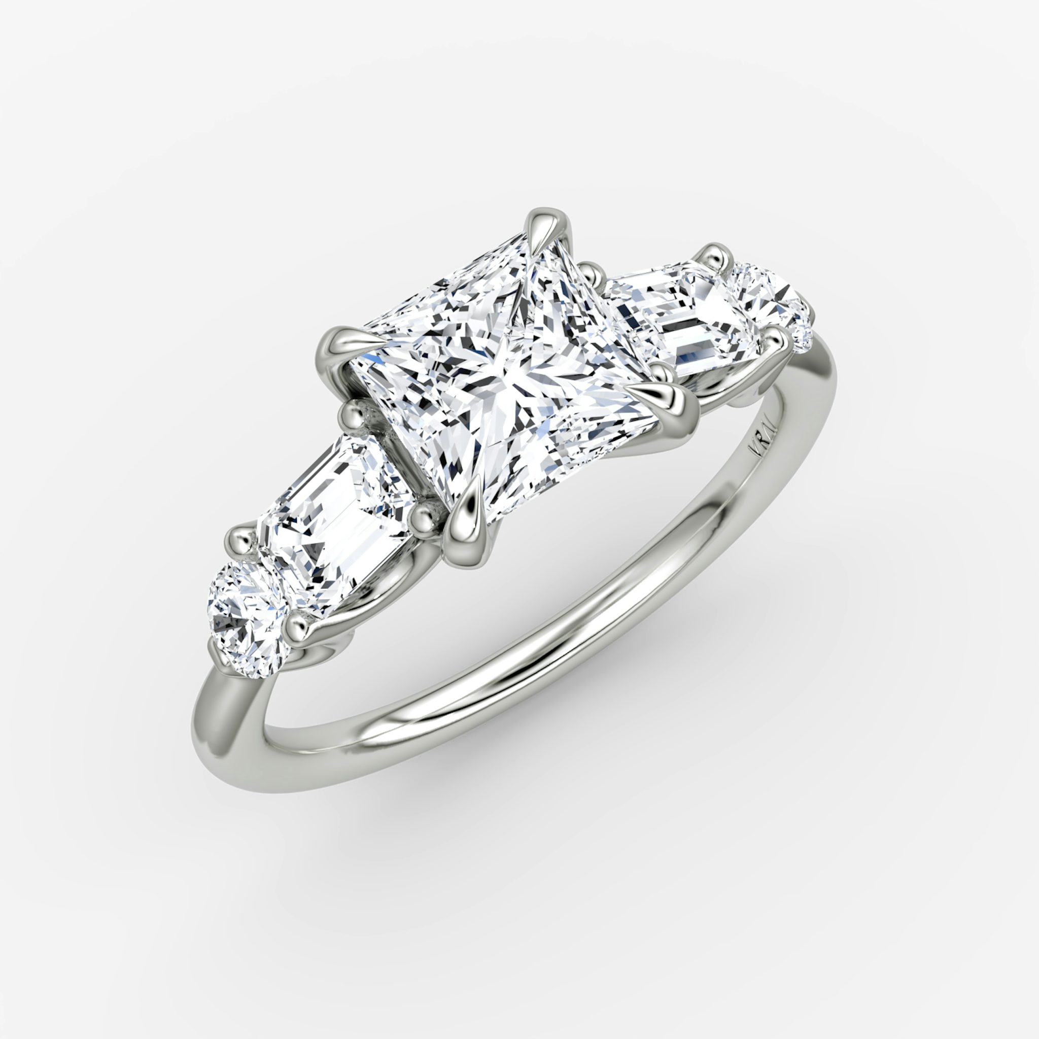 The Mixed Shape | Princess | 18k | White Gold | bandAccent: Plain | sideStoneOrientation: horizontal | sideStoneShape: Emerald and Round Brilliant | diamondOrientation: vertical | caratWeight: other