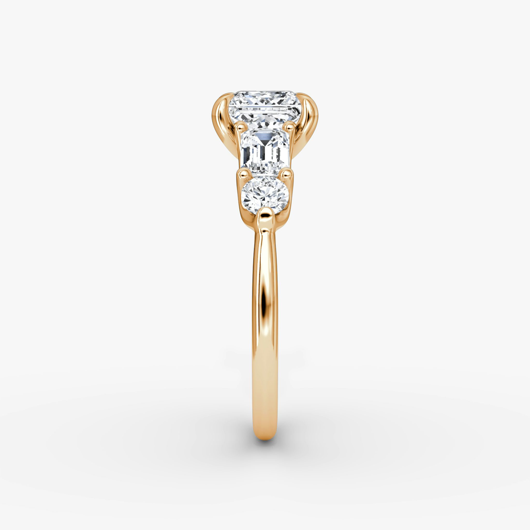 The Mixed Shape | Princess | 14k | Rose Gold | bandAccent: Plain | sideStoneOrientation: horizontal | sideStoneShape: Emerald and Round Brilliant | diamondOrientation: vertical | caratWeight: other