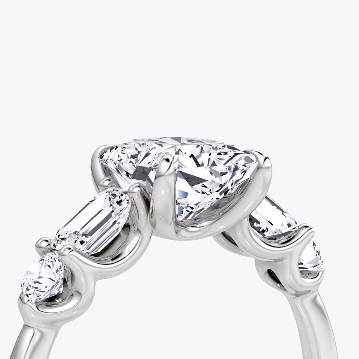 The Mixed Shape | Radiant | Platinum | bandAccent: Plain | sideStoneOrientation: horizontal | sideStoneShape: Emerald and Round Brilliant | diamondOrientation: vertical | caratWeight: other