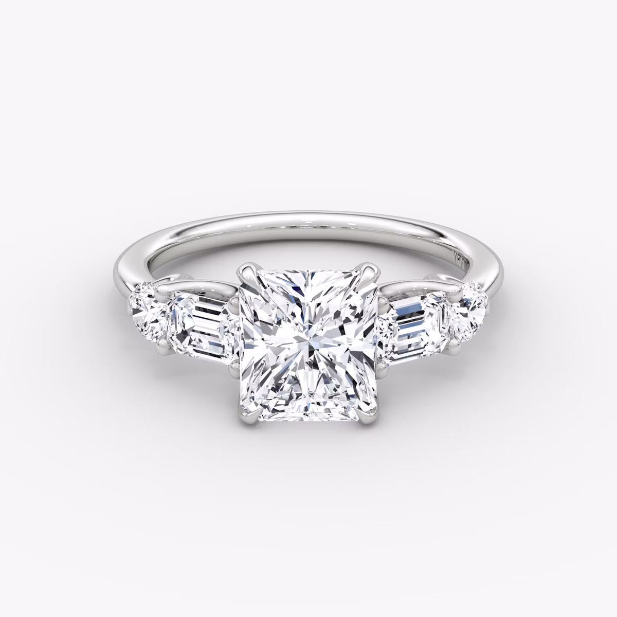 The Mixed Shape | Radiant | Platinum | bandAccent: Plain | sideStoneOrientation: horizontal | sideStoneShape: Emerald and Round Brilliant | diamondOrientation: vertical | caratWeight: other