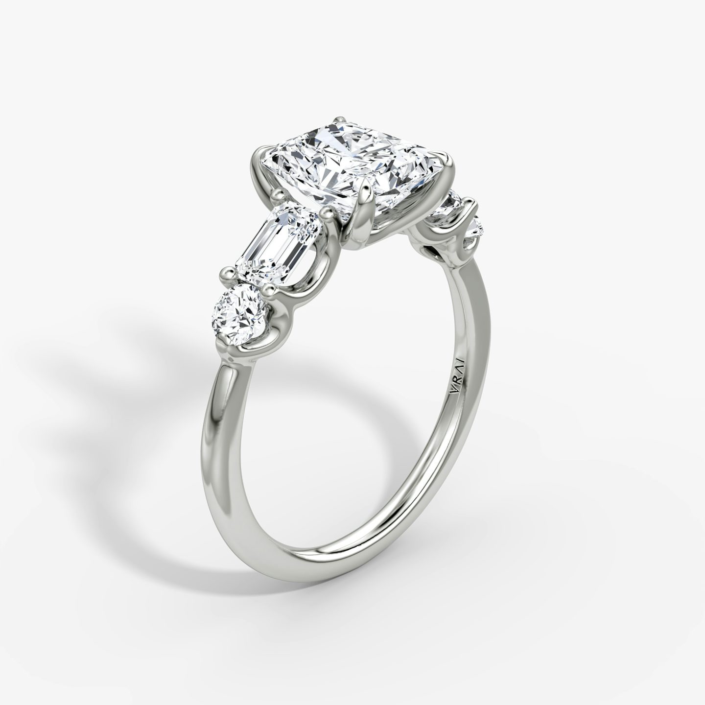 The Mixed Shape | Radiant | Platinum | bandAccent: Plain | sideStoneOrientation: horizontal | sideStoneShape: Emerald and Round Brilliant | diamondOrientation: vertical | caratWeight: other