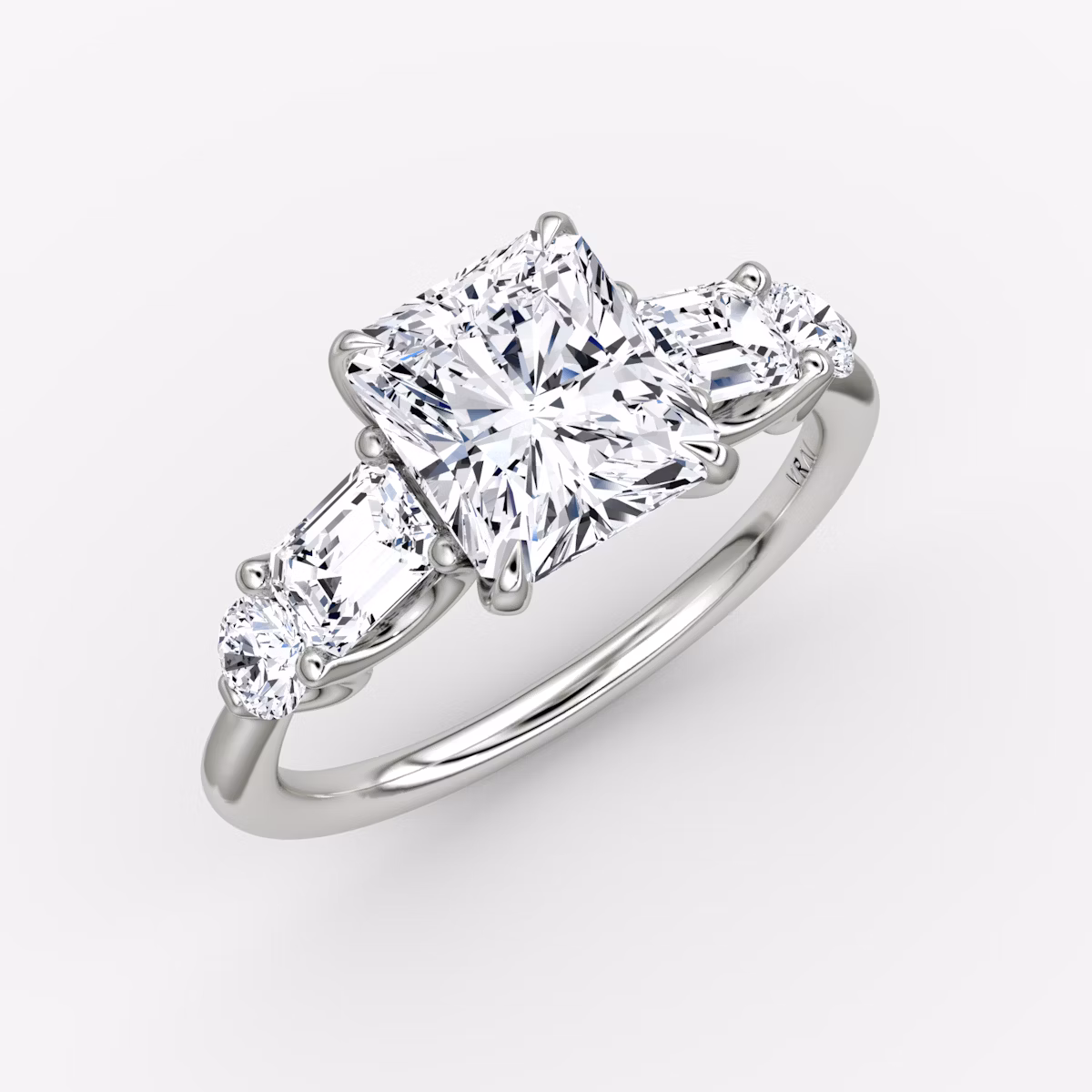 The Mixed Shape | Radiant | Platinum | bandAccent: Plain | sideStoneOrientation: horizontal | sideStoneShape: Emerald and Round Brilliant | diamondOrientation: vertical | caratWeight: other