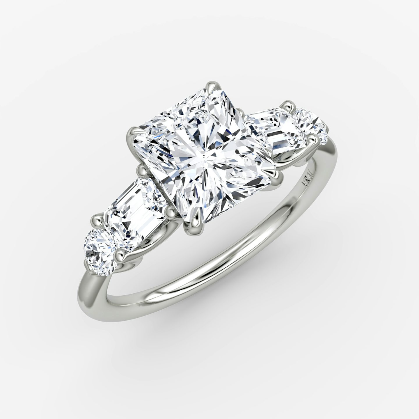 The Mixed Shape | Radiant | Platinum | bandAccent: Plain | sideStoneOrientation: horizontal | sideStoneShape: Emerald and Round Brilliant | diamondOrientation: vertical | caratWeight: other