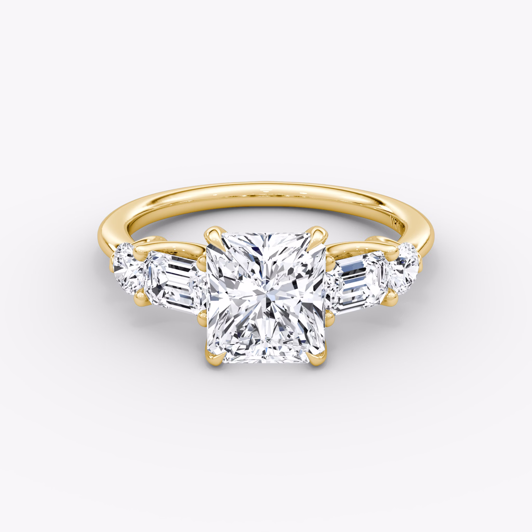 The Mixed Shape | Radiant | 18k | Yellow Gold | bandAccent: Plain | sideStoneOrientation: horizontal | sideStoneShape: Emerald and Round Brilliant | diamondOrientation: vertical | caratWeight: other