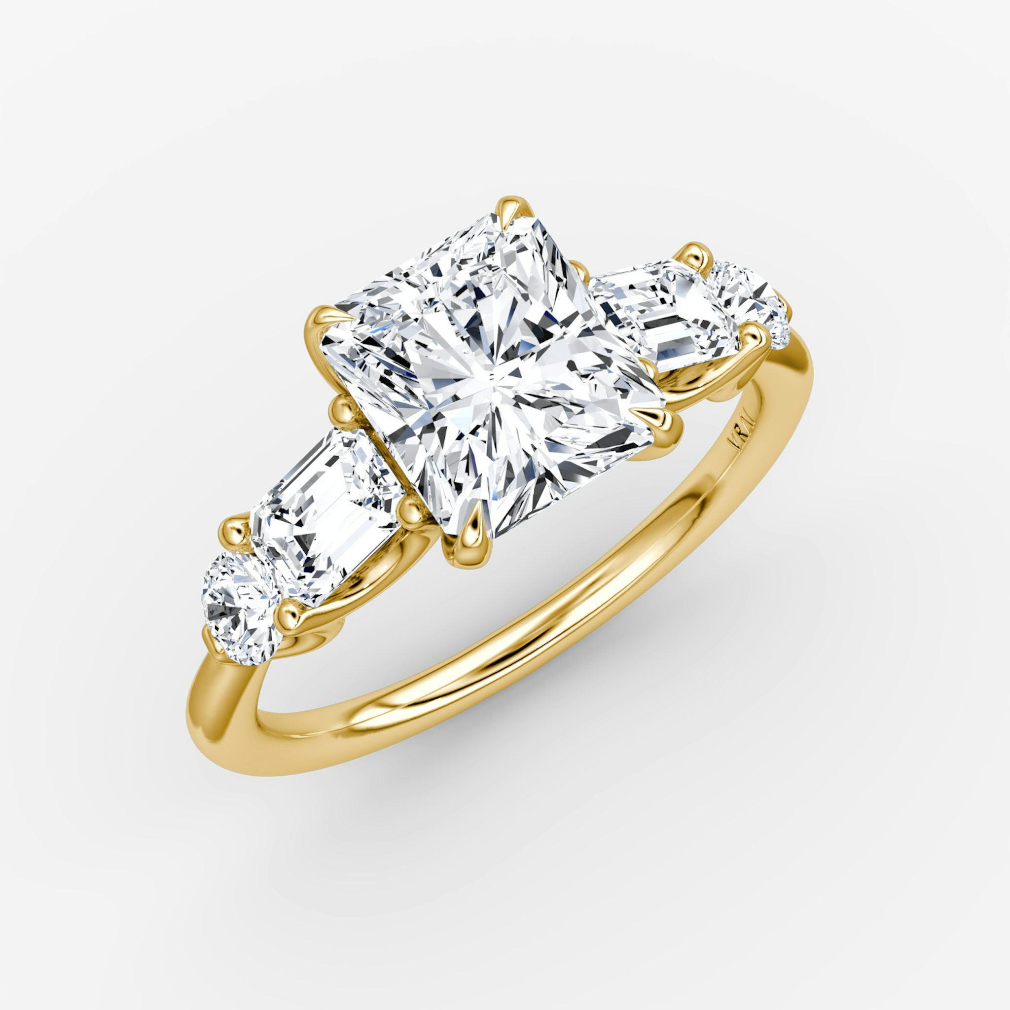 The Mixed Shape | Radiant | 18k | Yellow Gold | bandAccent: Plain | sideStoneOrientation: horizontal | sideStoneShape: Emerald and Round Brilliant | diamondOrientation: vertical | caratWeight: other