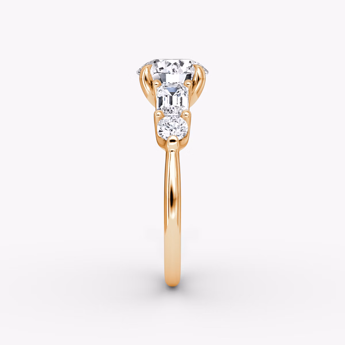 The Mixed Shape | Round Brilliant | 14k | Rose Gold | bandAccent: Plain | caratWeight: 1.5ct | sideStoneOrientation: horizontal | sideStoneShape: Emerald and Round Brilliant | diamondOrientation: vertical