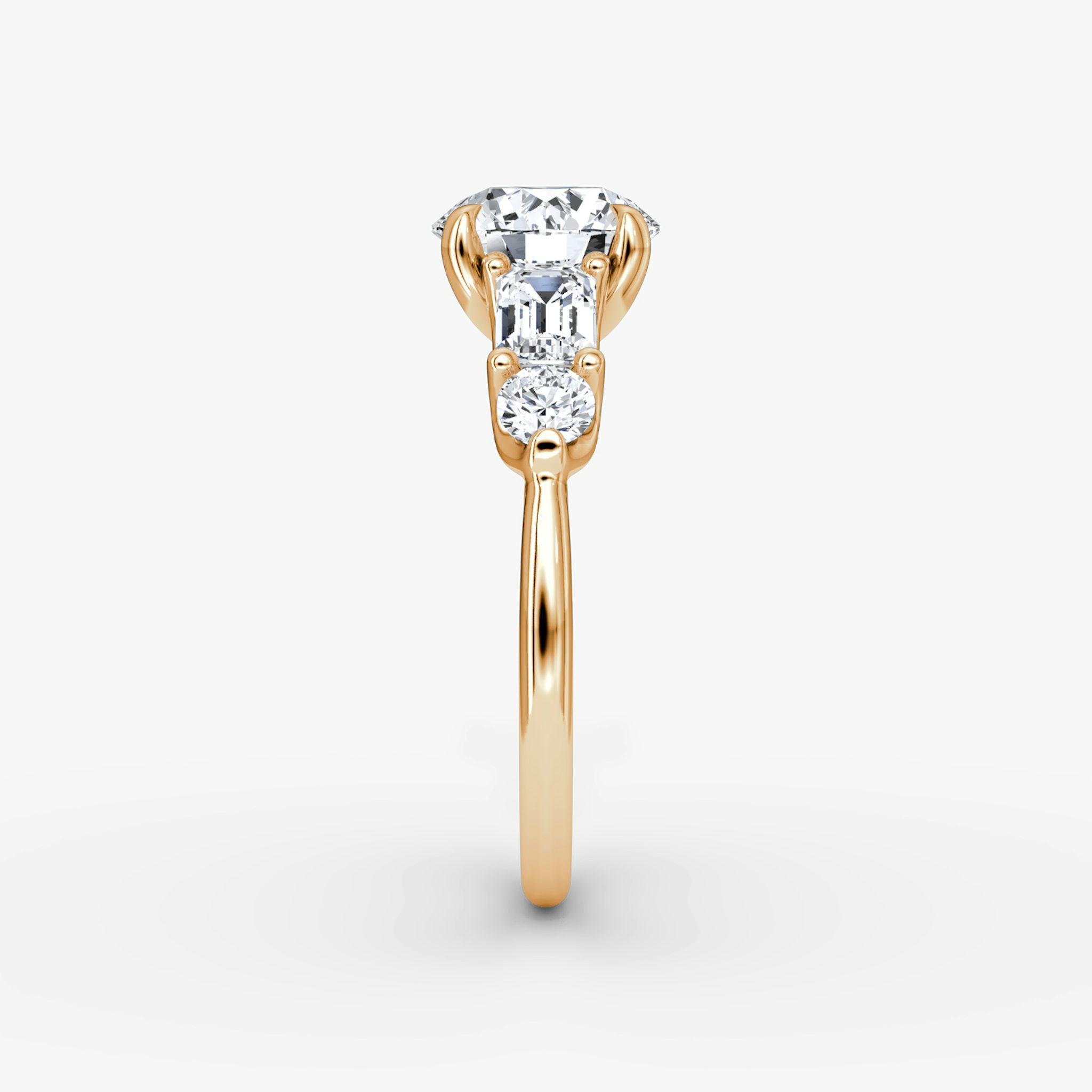 The Mixed Shape | Round Brilliant | 14k | Rose Gold | bandAccent: Plain | caratWeight: other | sideStoneOrientation: horizontal | sideStoneShape: Emerald and Round Brilliant | diamondOrientation: vertical
