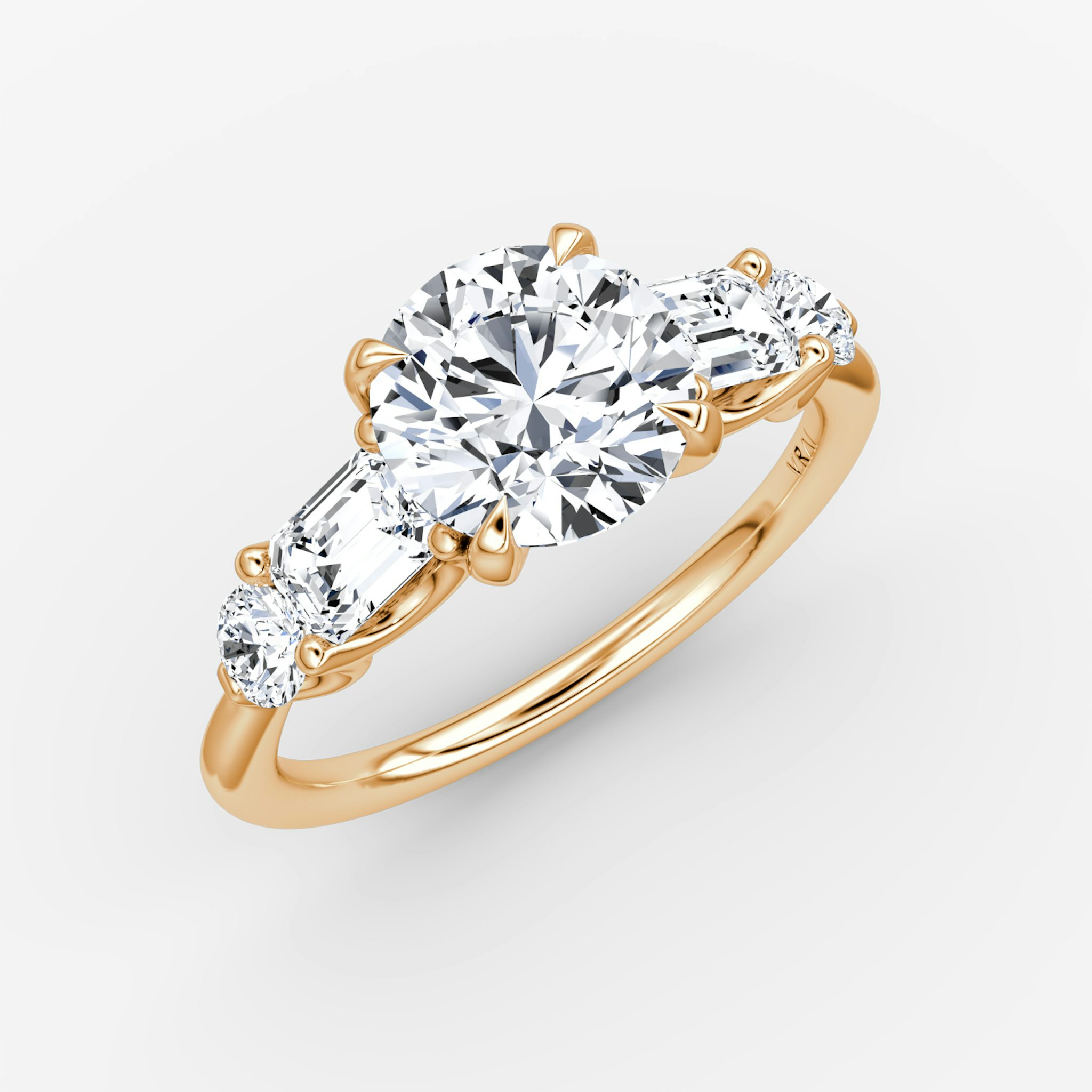 The Mixed Shape | Round Brilliant | 14k | Rose Gold | bandAccent: Plain | caratWeight: other | sideStoneOrientation: horizontal | sideStoneShape: Emerald and Round Brilliant | diamondOrientation: vertical