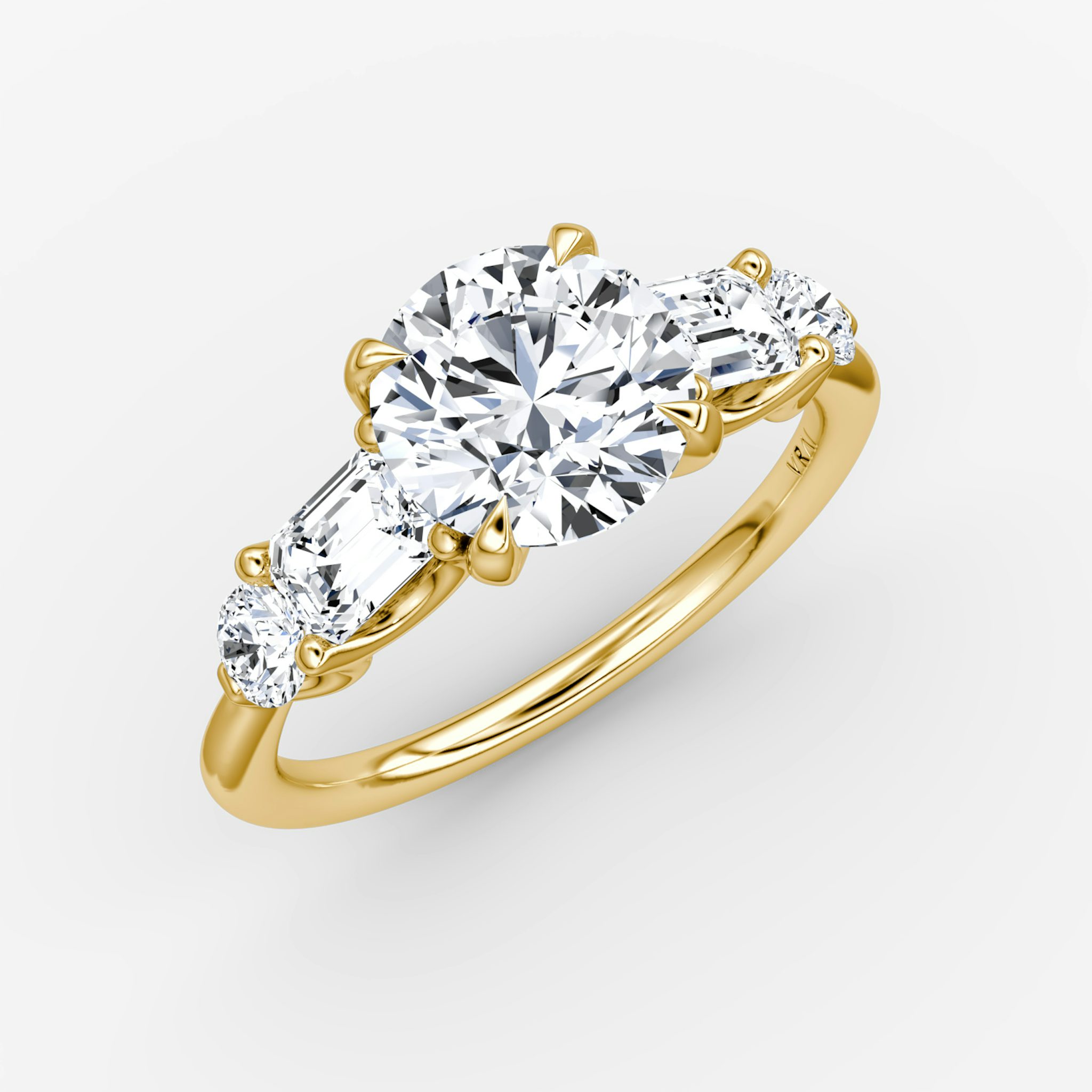 The Mixed Shape | Round Brilliant | 18k | Yellow Gold | bandAccent: Plain | caratWeight: other | sideStoneOrientation: horizontal | sideStoneShape: Emerald and Round Brilliant | diamondOrientation: vertical