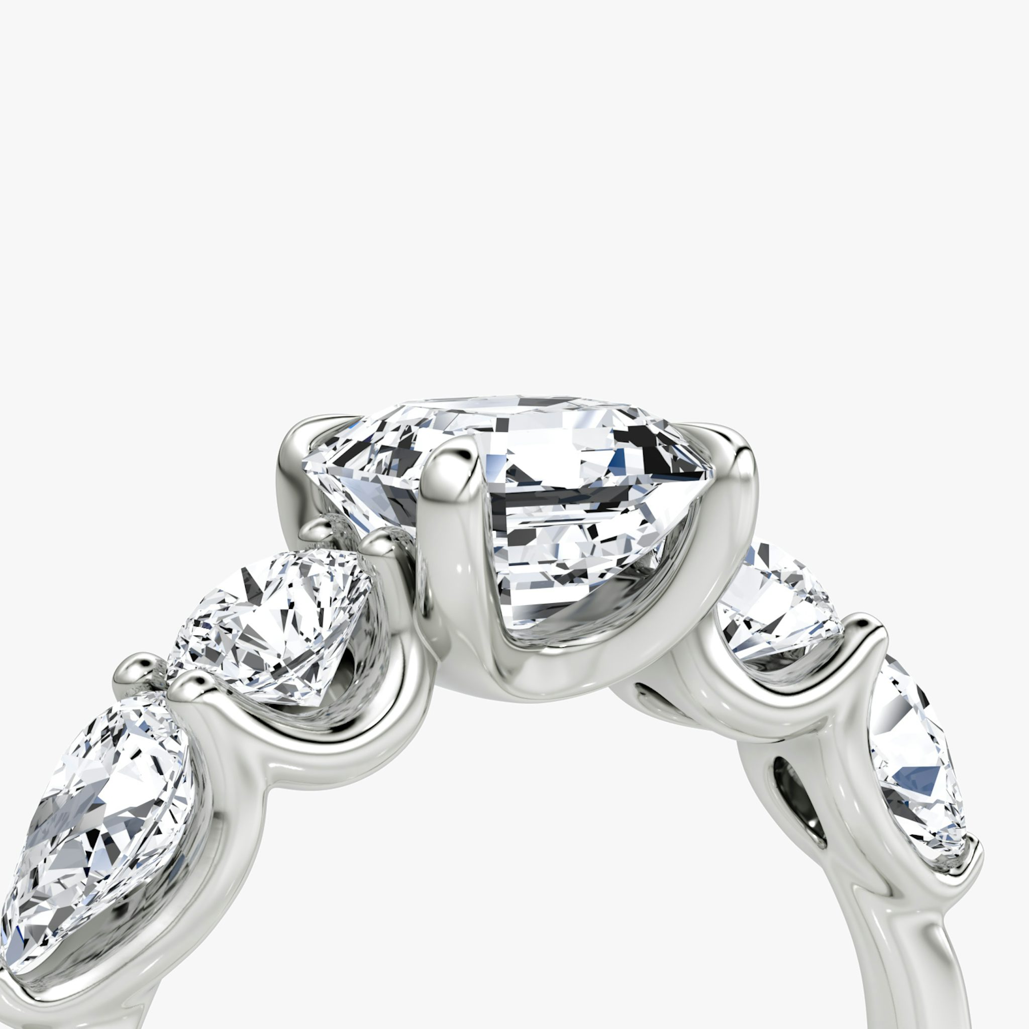 The Mixed Shape | Asscher | 18k | White Gold | bandAccent: Plain | sideStoneOrientation: horizontal | sideStoneShape: Round Brilliant and Pear | diamondOrientation: vertical | caratWeight: other