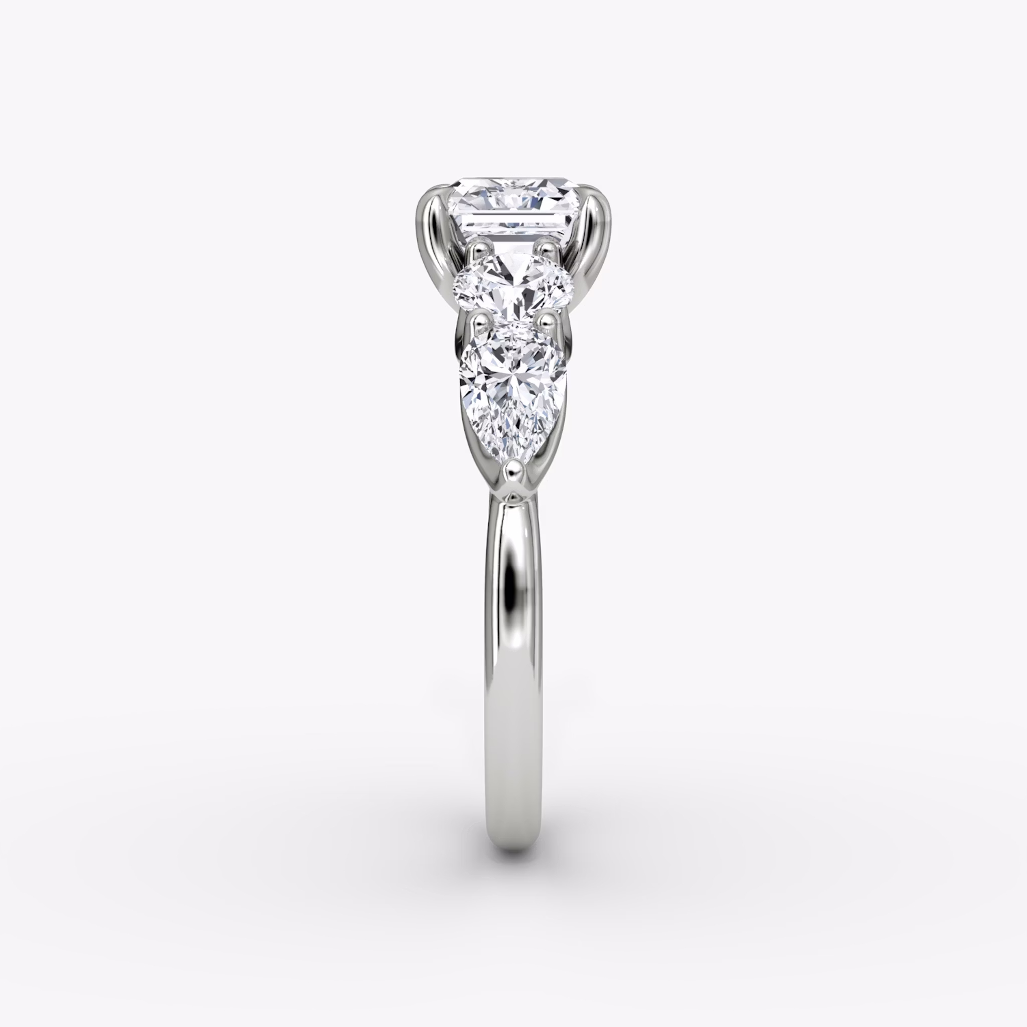 The Mixed Shape | Asscher | 18k | White Gold | bandAccent: Plain | sideStoneOrientation: horizontal | sideStoneShape: Round Brilliant and Pear | diamondOrientation: vertical | caratWeight: other