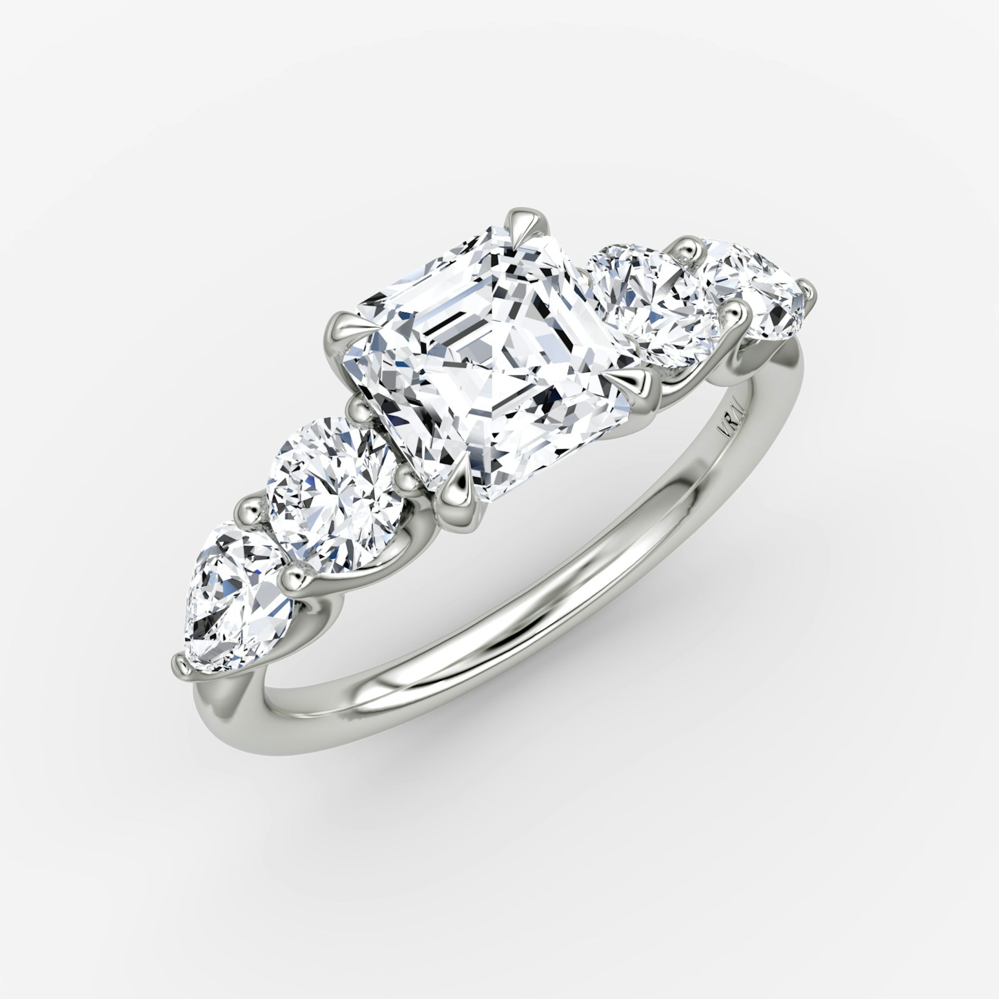 The Mixed Shape | Asscher | 18k | White Gold | bandAccent: Plain | sideStoneOrientation: horizontal | sideStoneShape: Round Brilliant and Pear | diamondOrientation: vertical | caratWeight: other