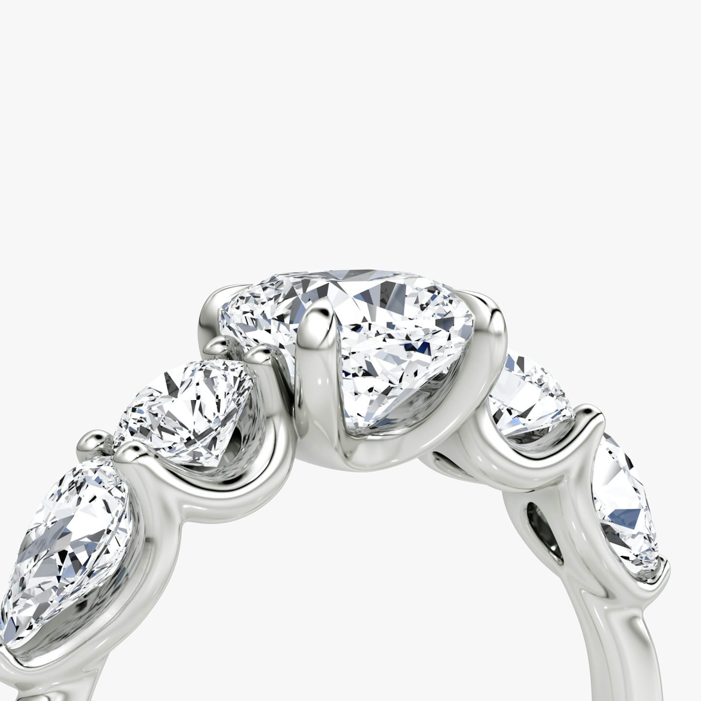 The Mixed Shape | Cushion | Platinum | bandAccent: Plain | sideStoneOrientation: horizontal | sideStoneShape: Round Brilliant and Pear | diamondOrientation: vertical | caratWeight: other
