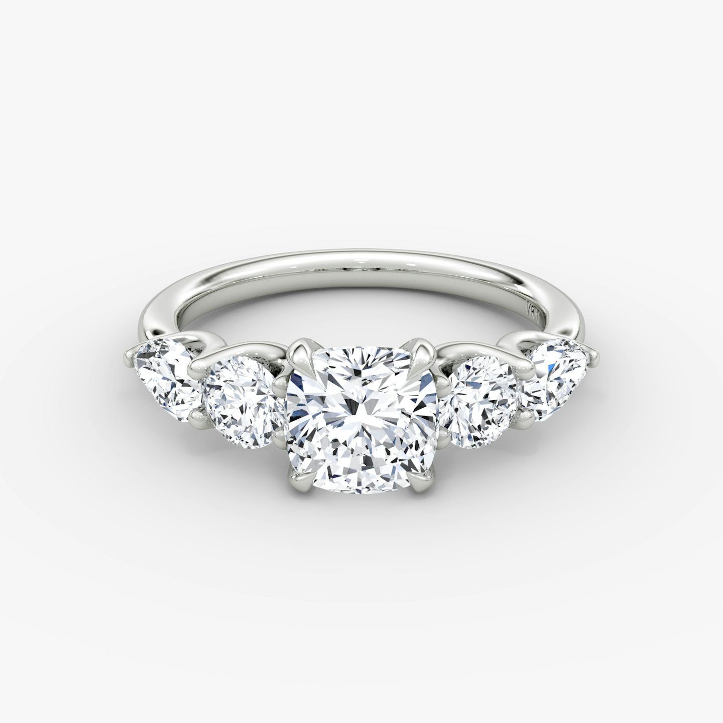 The Mixed Shape | Cushion | Platinum | bandAccent: Plain | sideStoneOrientation: horizontal | sideStoneShape: Round Brilliant and Pear | diamondOrientation: vertical | caratWeight: other