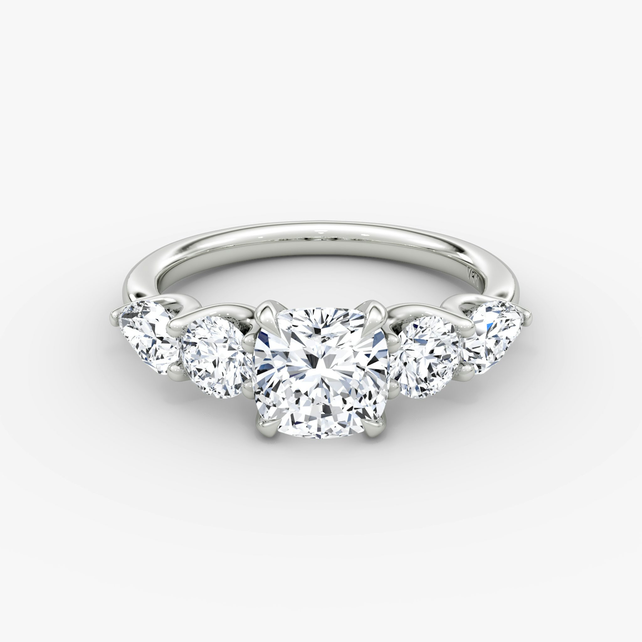 The Mixed Shape | Cushion | 18k | White Gold | bandAccent: Plain | sideStoneOrientation: horizontal | sideStoneShape: Round Brilliant and Pear | diamondOrientation: vertical | caratWeight: other