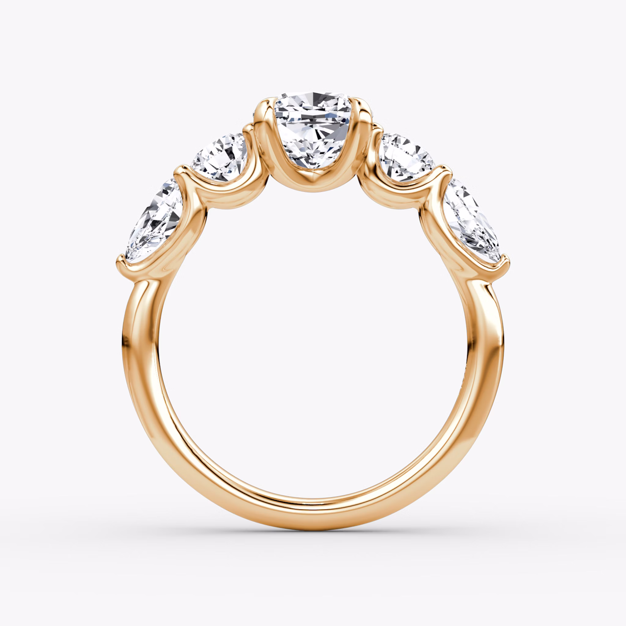 The Mixed Shape | Cushion | 14k | Rose Gold | bandAccent: Plain | sideStoneOrientation: horizontal | sideStoneShape: Round Brilliant and Pear | diamondOrientation: vertical | caratWeight: other