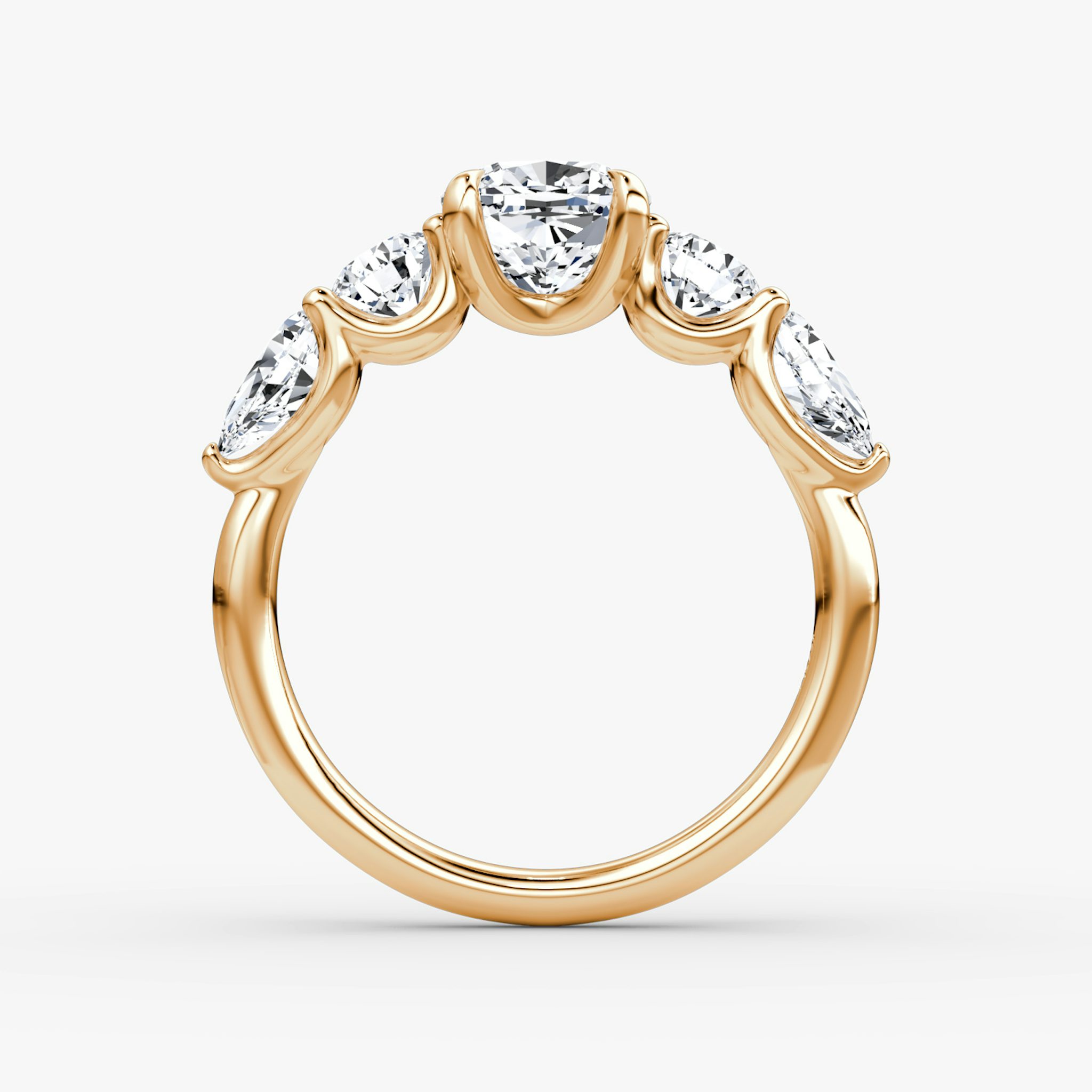 The Mixed Shape | Cushion | 14k | Rose Gold | bandAccent: Plain | sideStoneOrientation: horizontal | sideStoneShape: Round Brilliant and Pear | diamondOrientation: vertical | caratWeight: other