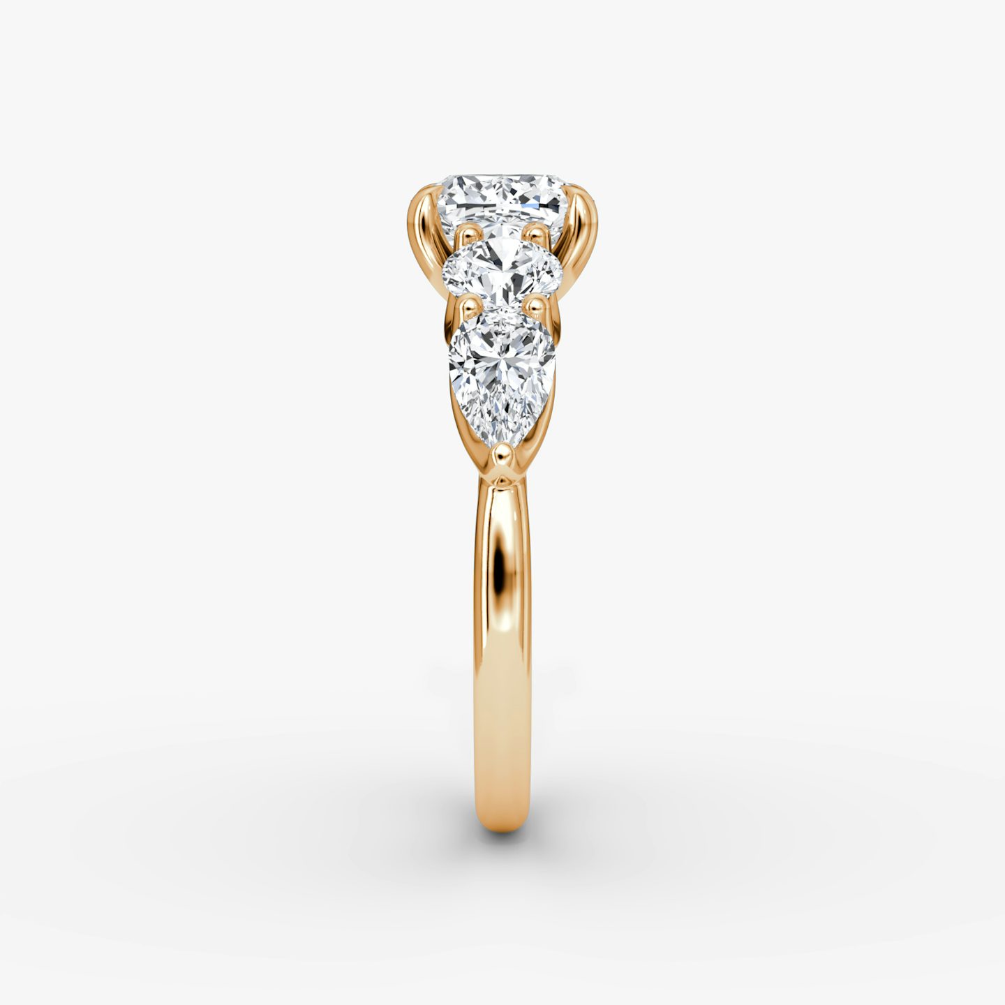 The Mixed Shape | Cushion | 14k | Rose Gold | bandAccent: Plain | sideStoneOrientation: horizontal | sideStoneShape: Round Brilliant and Pear | diamondOrientation: vertical | caratWeight: other