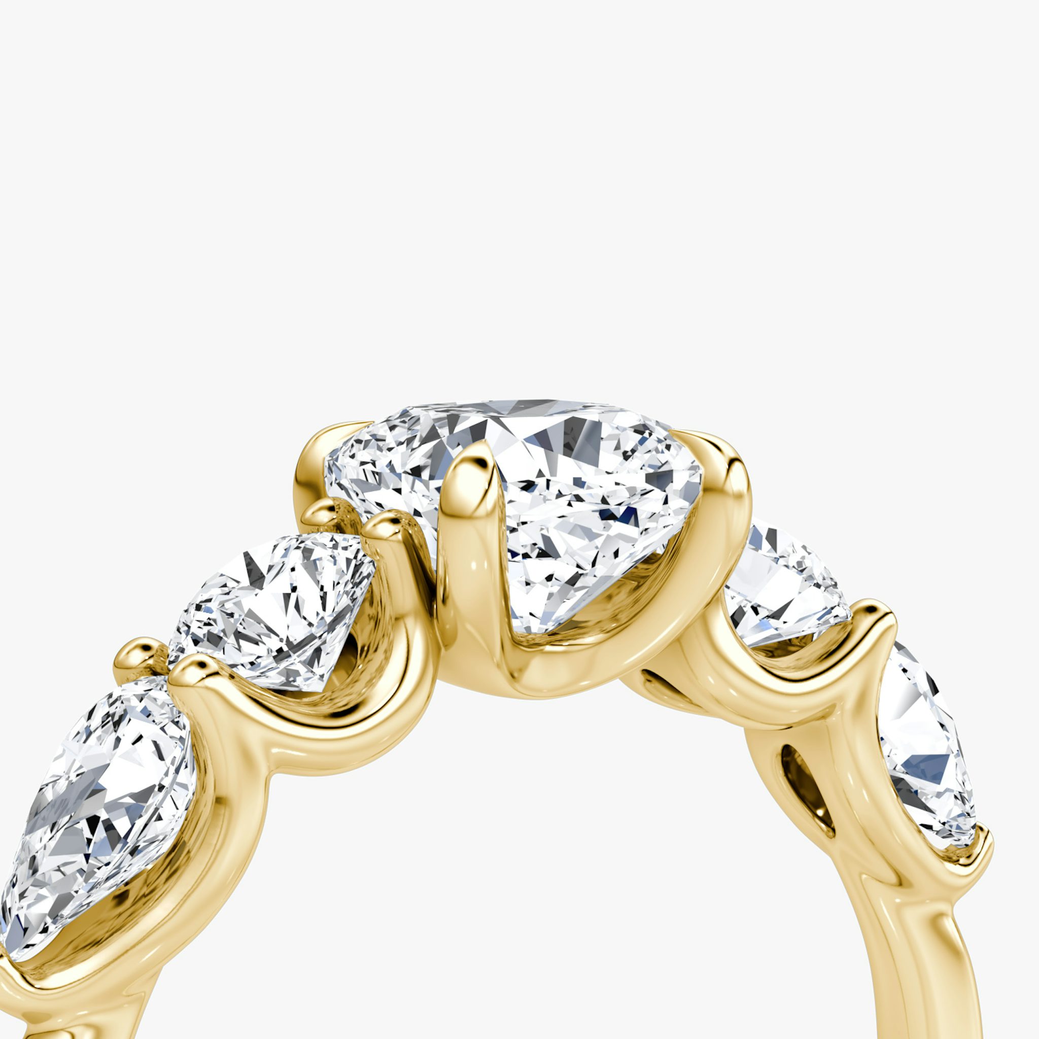 The Mixed Shape | Cushion | 18k | Yellow Gold | bandAccent: Plain | sideStoneOrientation: horizontal | sideStoneShape: Round Brilliant and Pear | diamondOrientation: vertical | caratWeight: other