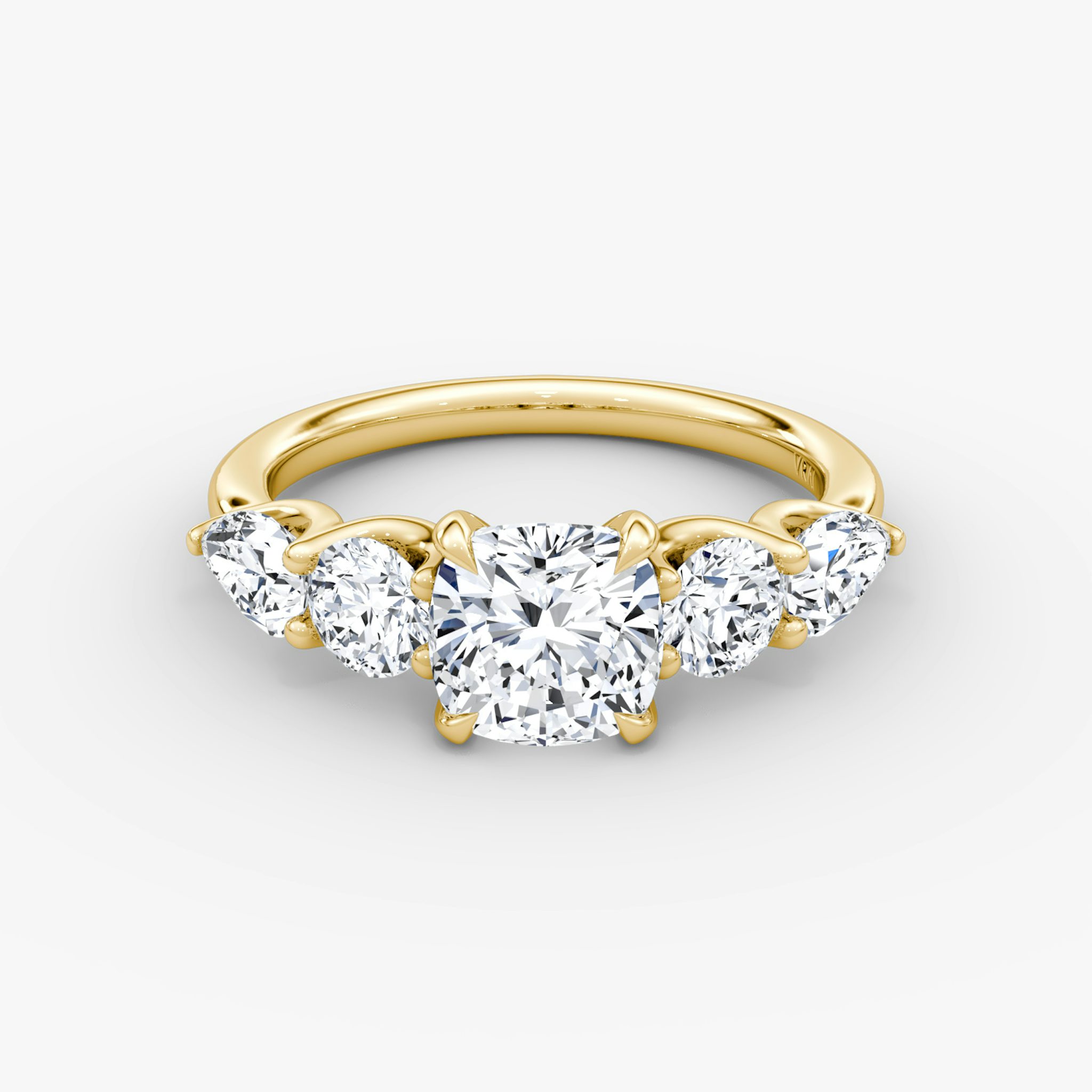 The Mixed Shape | Cushion | 18k | Yellow Gold | bandAccent: Plain | sideStoneOrientation: horizontal | sideStoneShape: Round Brilliant and Pear | diamondOrientation: vertical | caratWeight: other