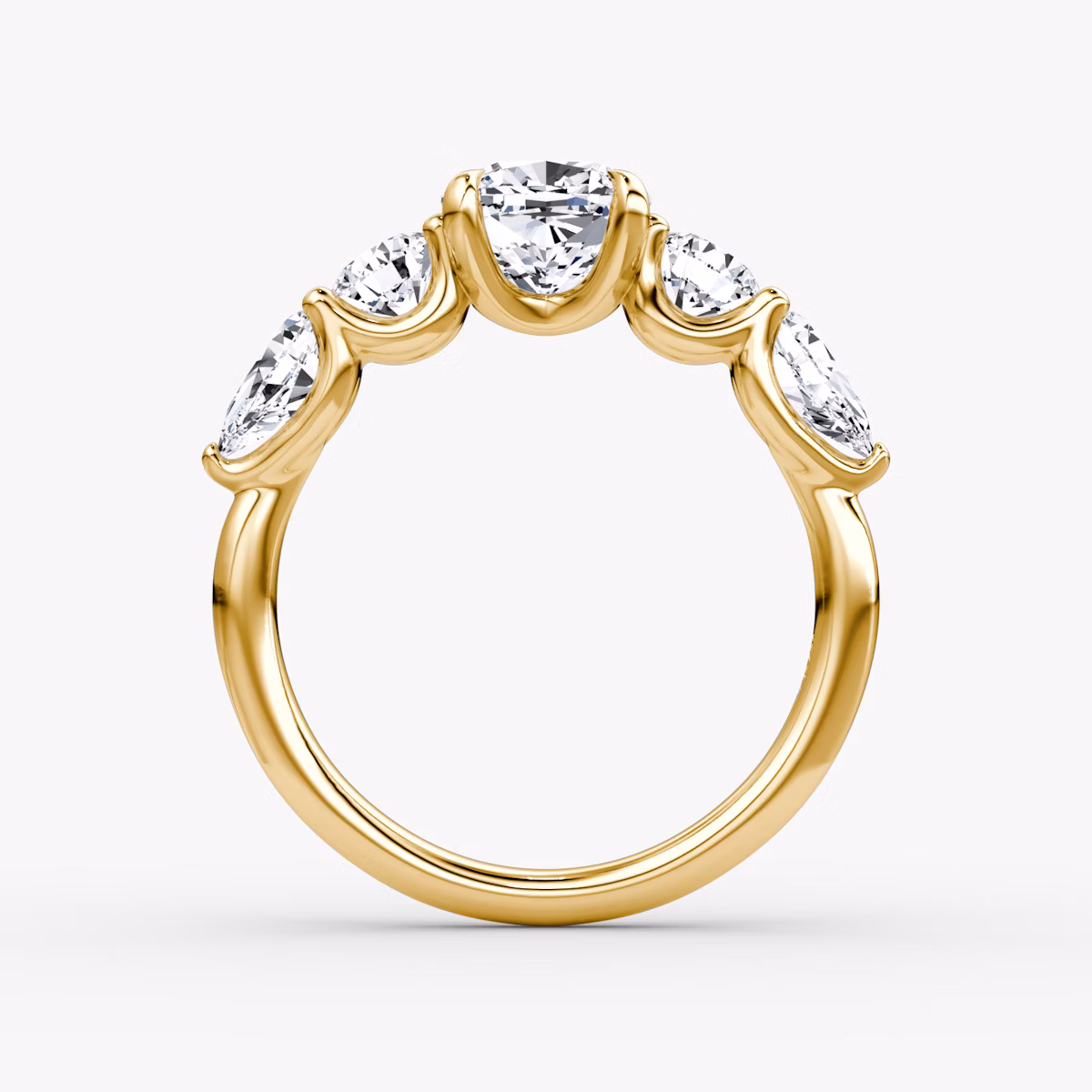 The Mixed Shape | Cushion | 18k | Yellow Gold | bandAccent: Plain | sideStoneOrientation: horizontal | sideStoneShape: Round Brilliant and Pear | diamondOrientation: vertical | caratWeight: other