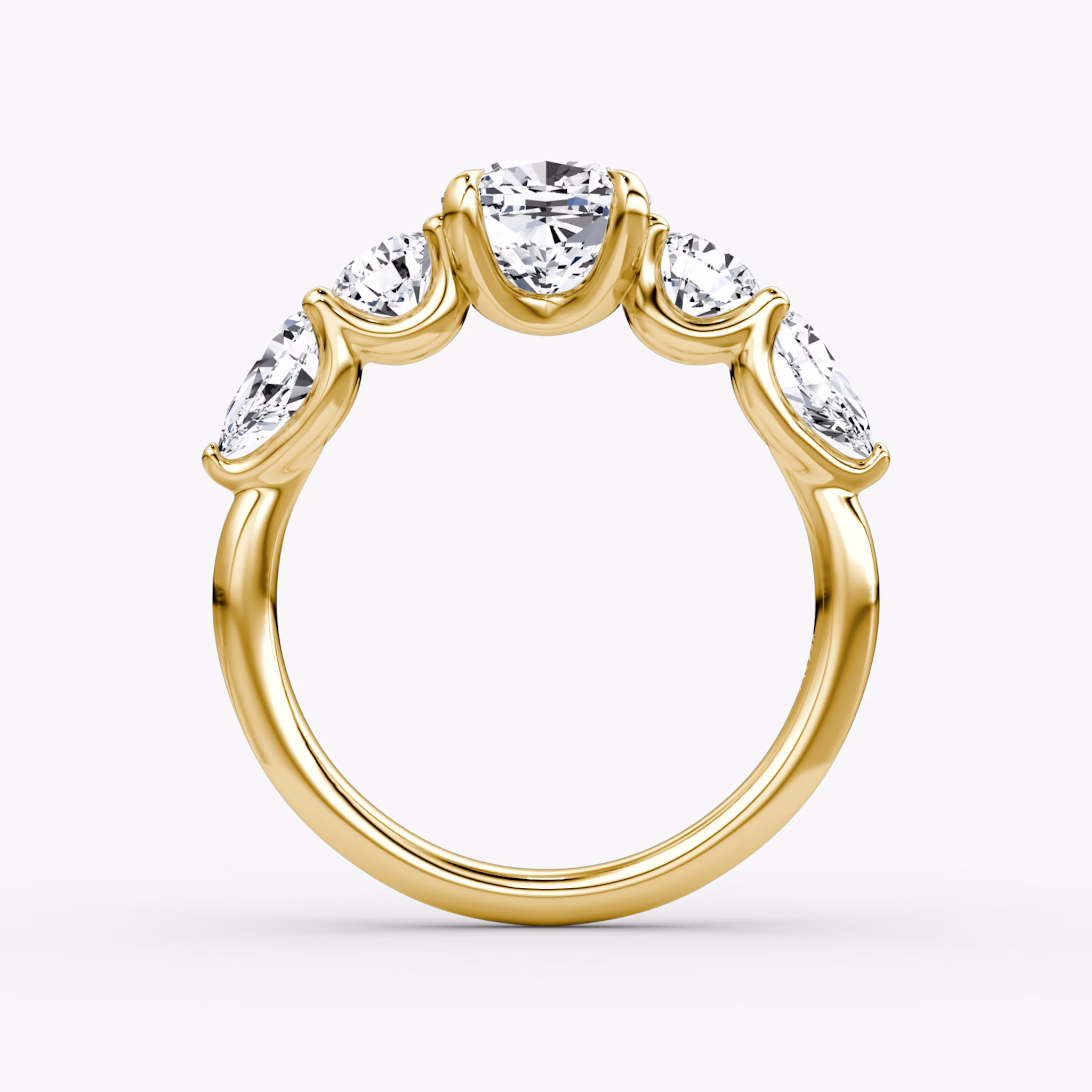 The Mixed Shape | Cushion | 18k | Yellow Gold | bandAccent: Plain | sideStoneOrientation: horizontal | sideStoneShape: Round Brilliant and Pear | diamondOrientation: vertical | caratWeight: other