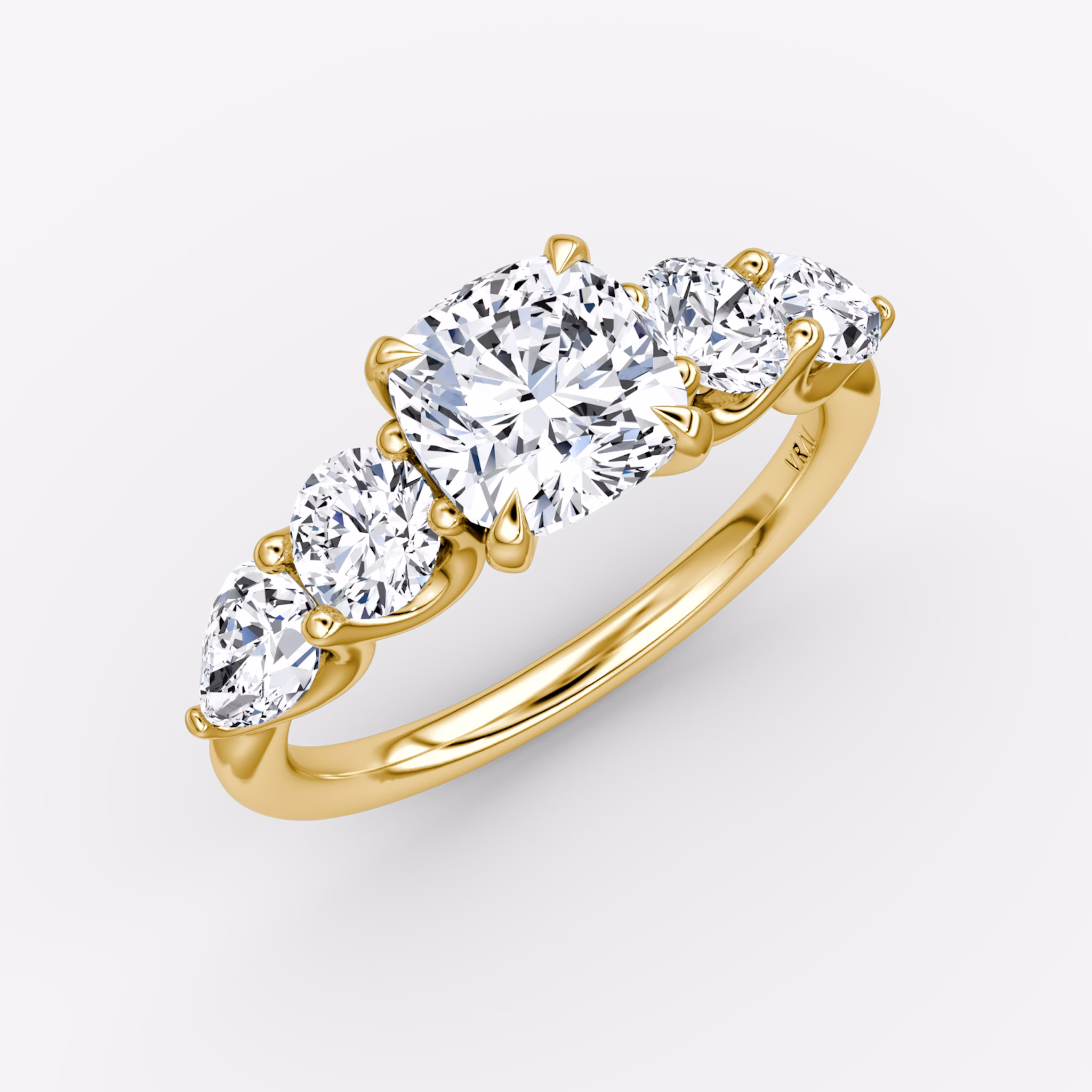 The Mixed Shape | Cushion | 18k | Yellow Gold | bandAccent: Plain | sideStoneOrientation: horizontal | sideStoneShape: Round Brilliant and Pear | diamondOrientation: vertical | caratWeight: other