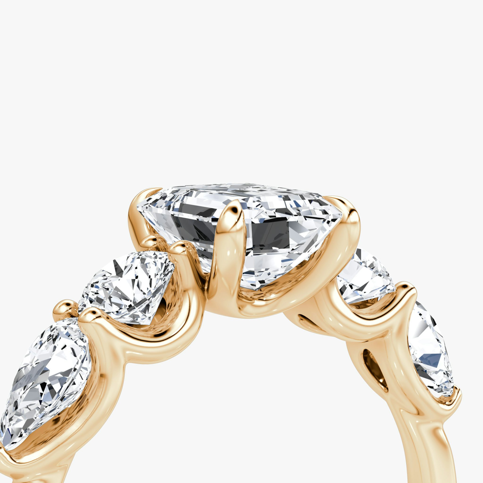 The Mixed Shape | Emerald | 14k | Rose Gold | bandAccent: Plain | sideStoneOrientation: horizontal | sideStoneShape: Round Brilliant and Pear | diamondOrientation: vertical | caratWeight: other