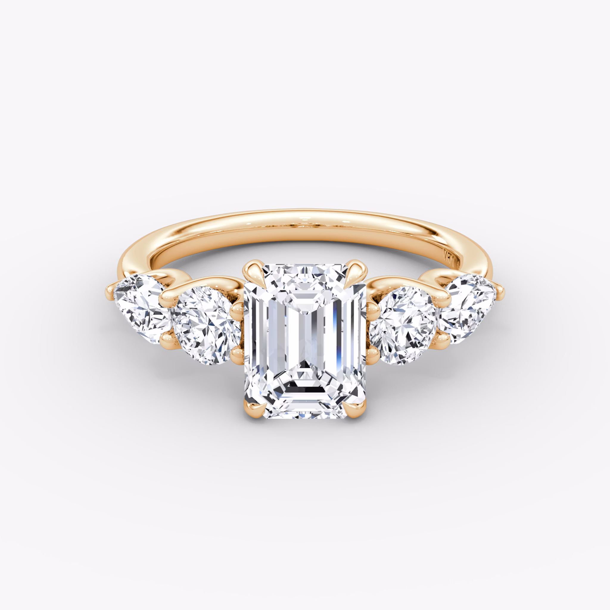 The Mixed Shape | Emerald | 14k | Rose Gold | bandAccent: Plain | sideStoneOrientation: horizontal | sideStoneShape: Round Brilliant and Pear | diamondOrientation: vertical | caratWeight: other