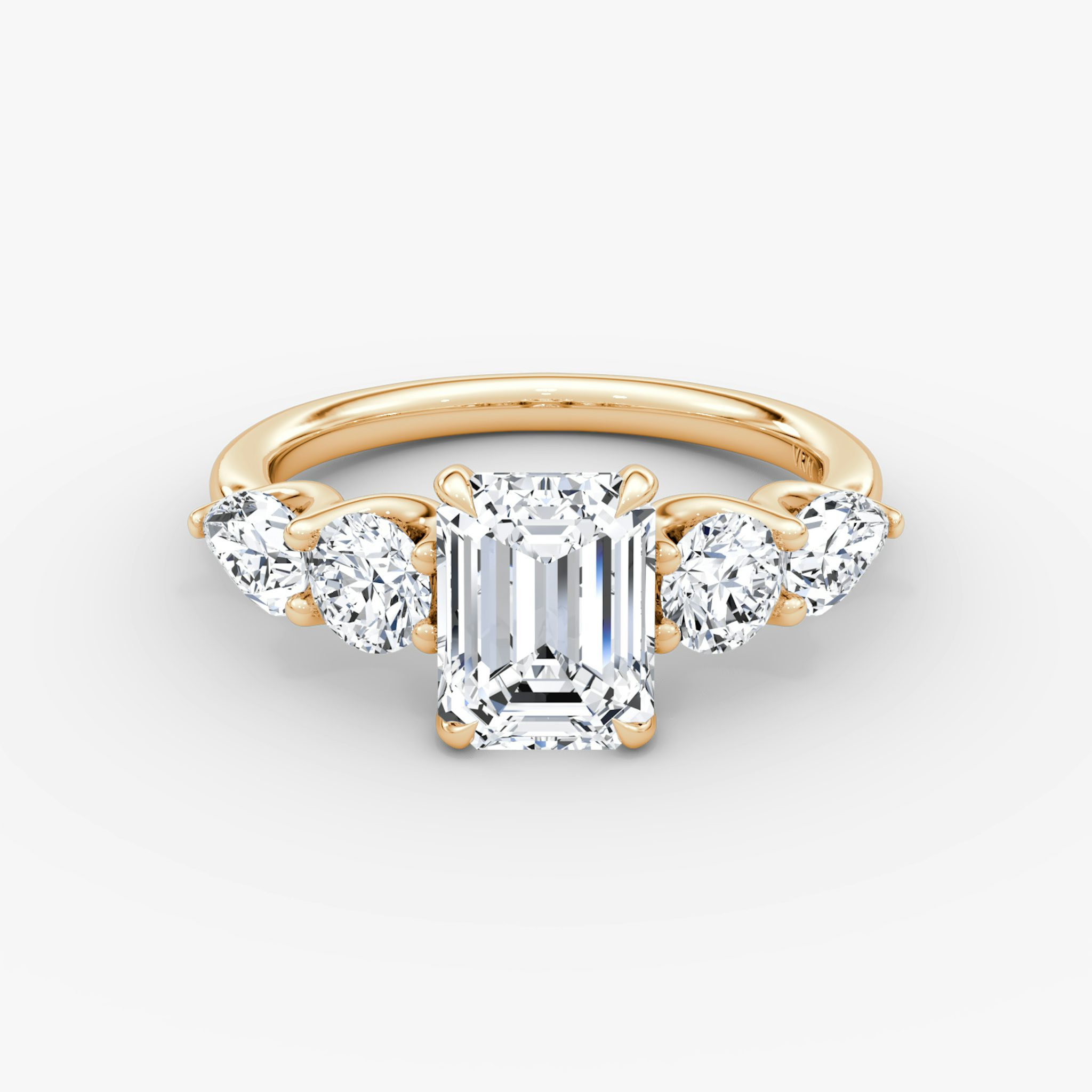 The Mixed Shape | Emerald | 14k | Rose Gold | bandAccent: Plain | sideStoneOrientation: horizontal | sideStoneShape: Round Brilliant and Pear | diamondOrientation: vertical | caratWeight: other