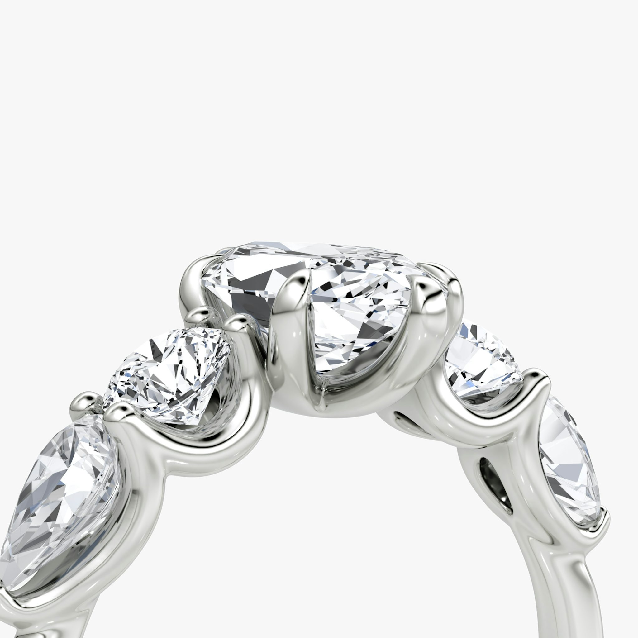 The Mixed Shape | Marquise | 18k | White Gold | bandAccent: Plain | sideStoneOrientation: horizontal | sideStoneShape: Round Brilliant and Pear | diamondOrientation: vertical | caratWeight: other