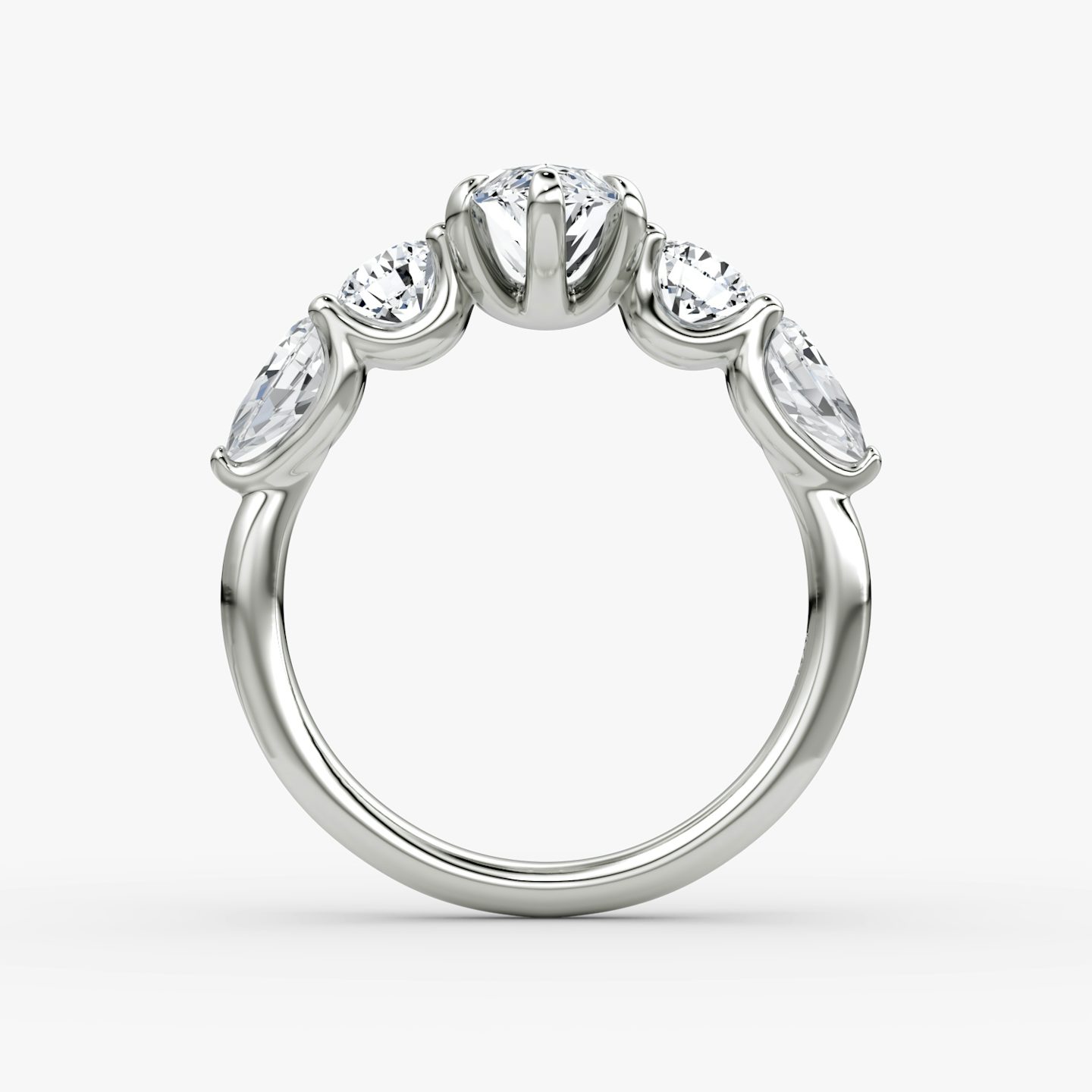 The Mixed Shape | Marquise | 18k | White Gold | bandAccent: Plain | sideStoneOrientation: horizontal | sideStoneShape: Round Brilliant and Pear | diamondOrientation: vertical | caratWeight: other