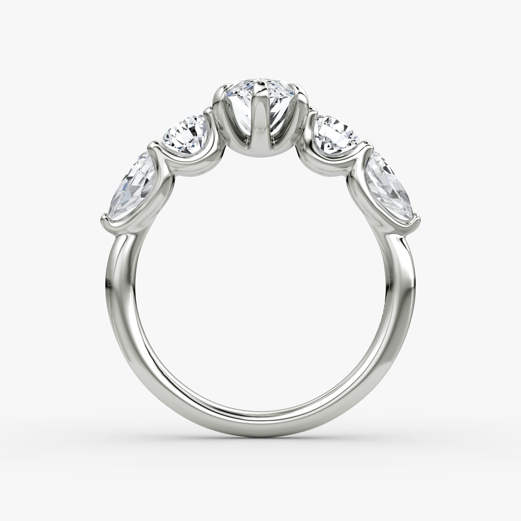 The Mixed Shape | Marquise | 18k | White Gold | bandAccent: Plain | sideStoneOrientation: horizontal | sideStoneShape: Round Brilliant and Pear | diamondOrientation: vertical | caratWeight: other