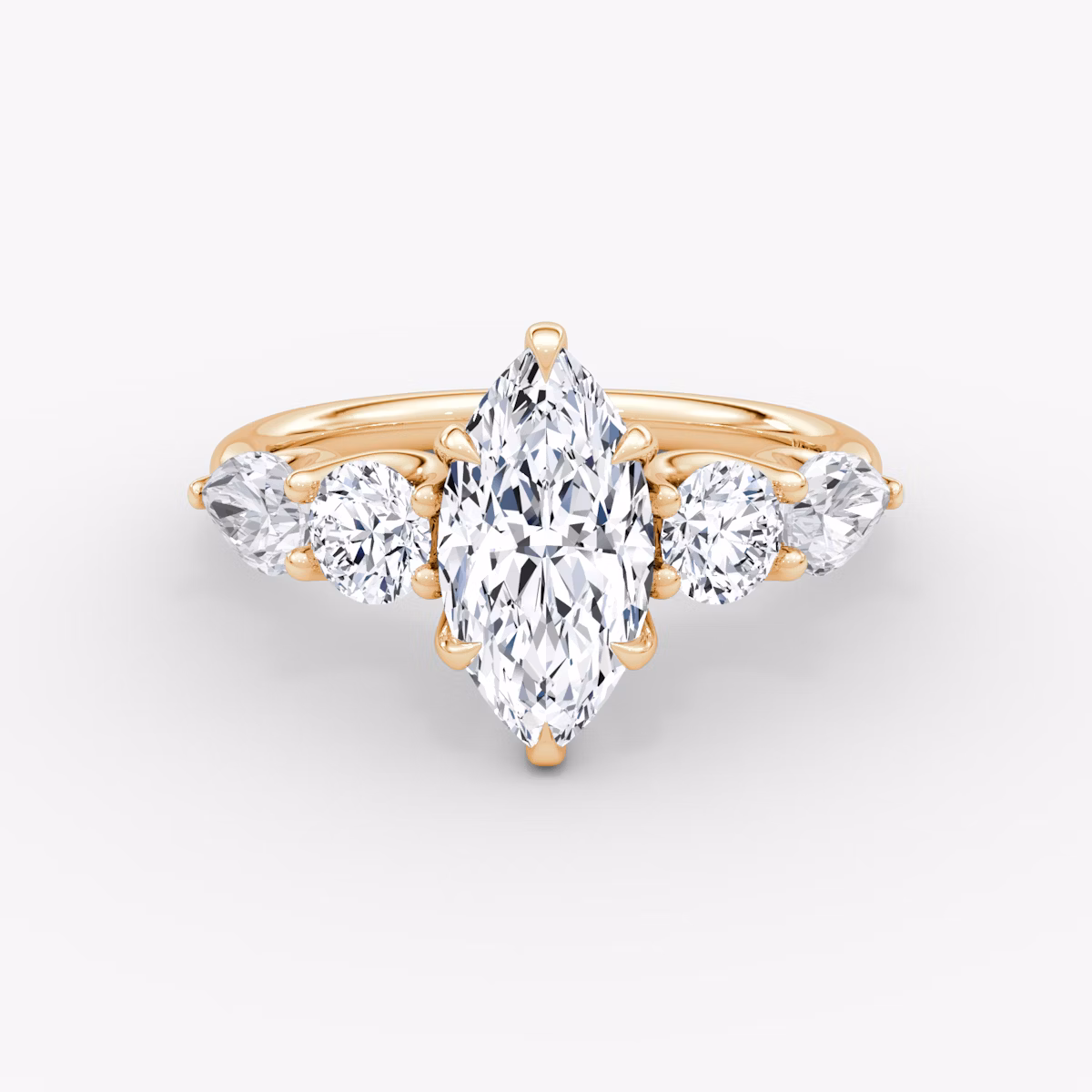 The Mixed Shape | Marquise | 14k | Rose Gold | bandAccent: Plain | sideStoneOrientation: horizontal | sideStoneShape: Round Brilliant and Pear | diamondOrientation: vertical | caratWeight: other
