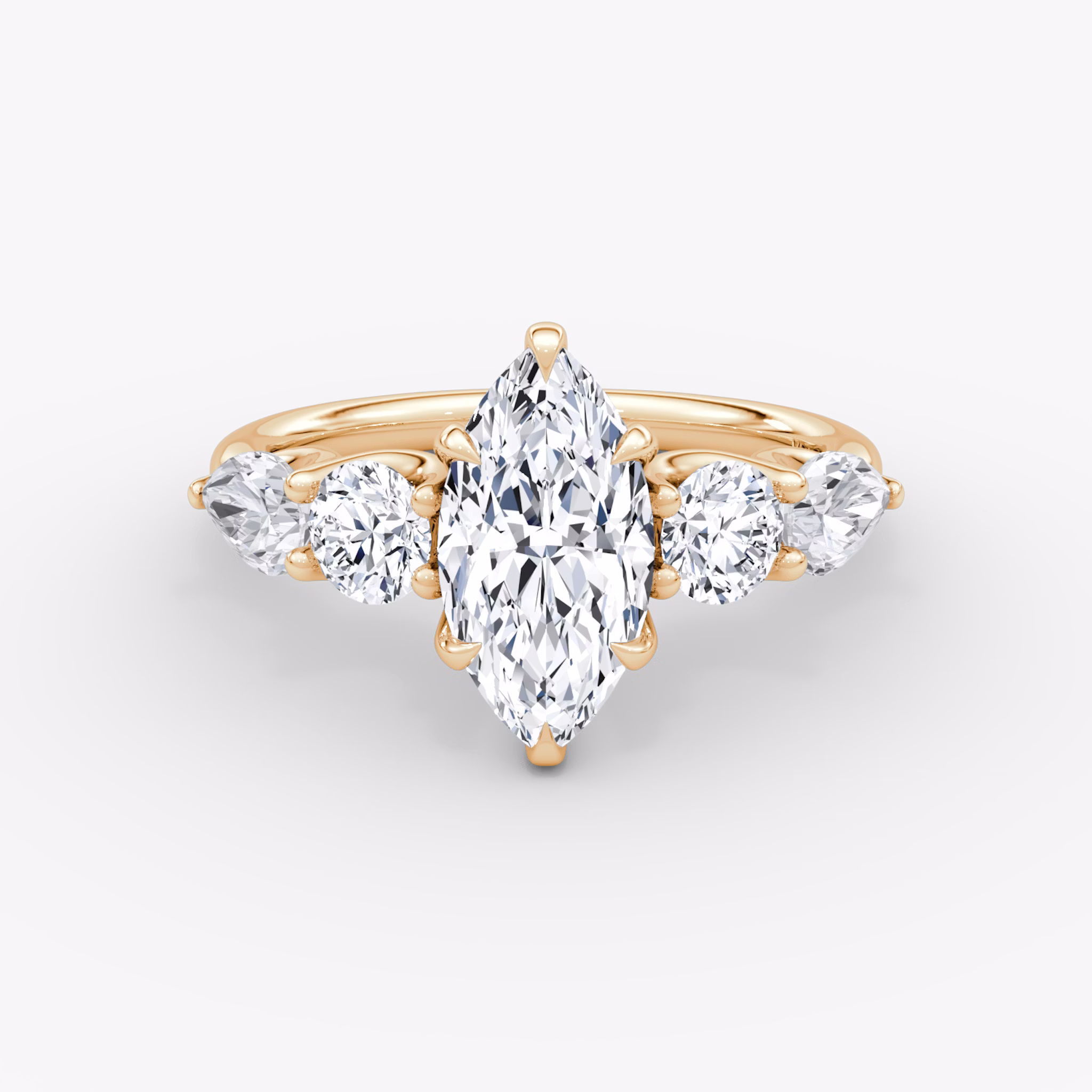 The Mixed Shape | Marquise | 14k | Rose Gold | bandAccent: Plain | sideStoneOrientation: horizontal | sideStoneShape: Round Brilliant and Pear | diamondOrientation: vertical | caratWeight: other