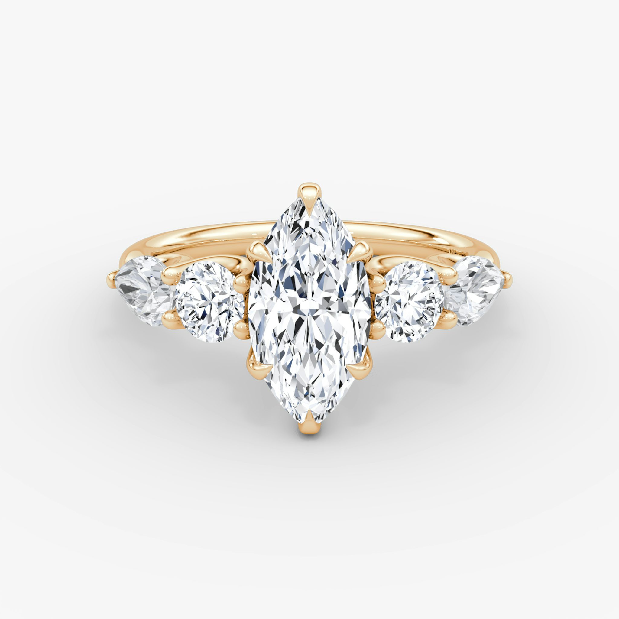 The Mixed Shape | Marquise | 14k | Rose Gold | bandAccent: Plain | sideStoneOrientation: horizontal | sideStoneShape: Round Brilliant and Pear | diamondOrientation: vertical | caratWeight: other