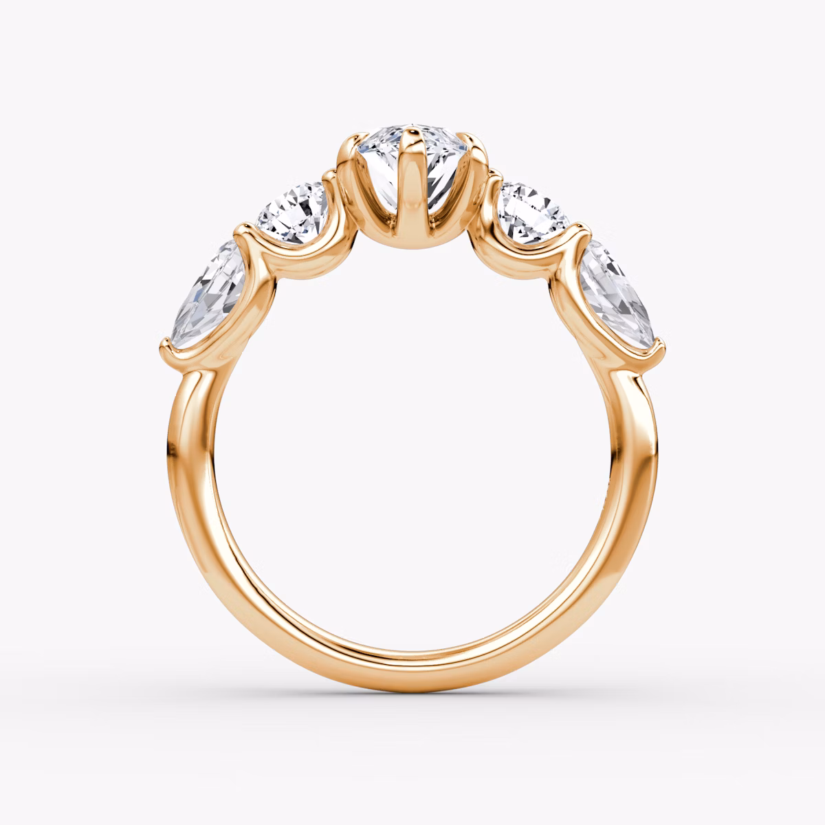 The Mixed Shape | Marquise | 14k | Rose Gold | bandAccent: Plain | sideStoneOrientation: horizontal | sideStoneShape: Round Brilliant and Pear | diamondOrientation: vertical | caratWeight: other
