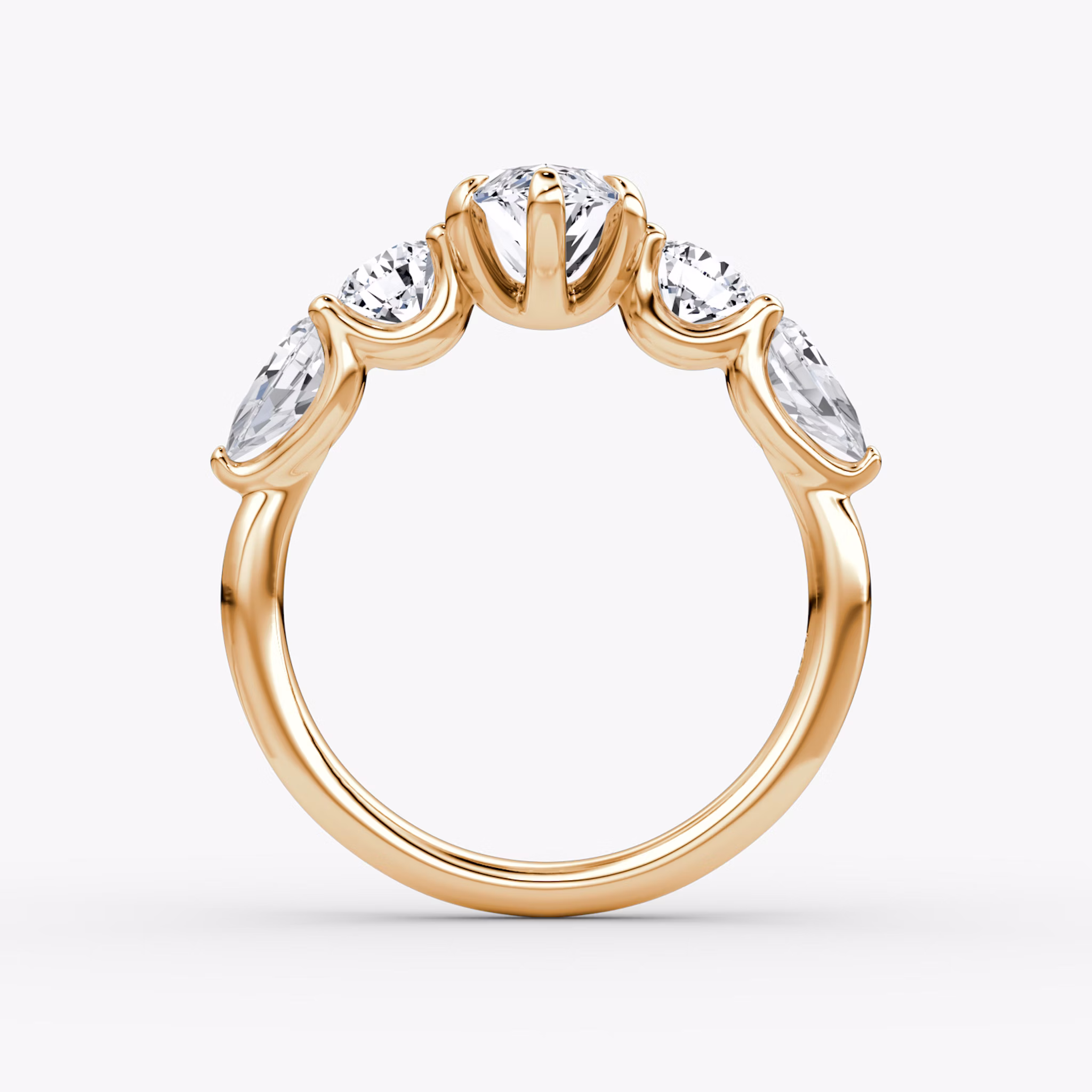 The Mixed Shape | Marquise | 14k | Rose Gold | bandAccent: Plain | sideStoneOrientation: horizontal | sideStoneShape: Round Brilliant and Pear | diamondOrientation: vertical | caratWeight: other