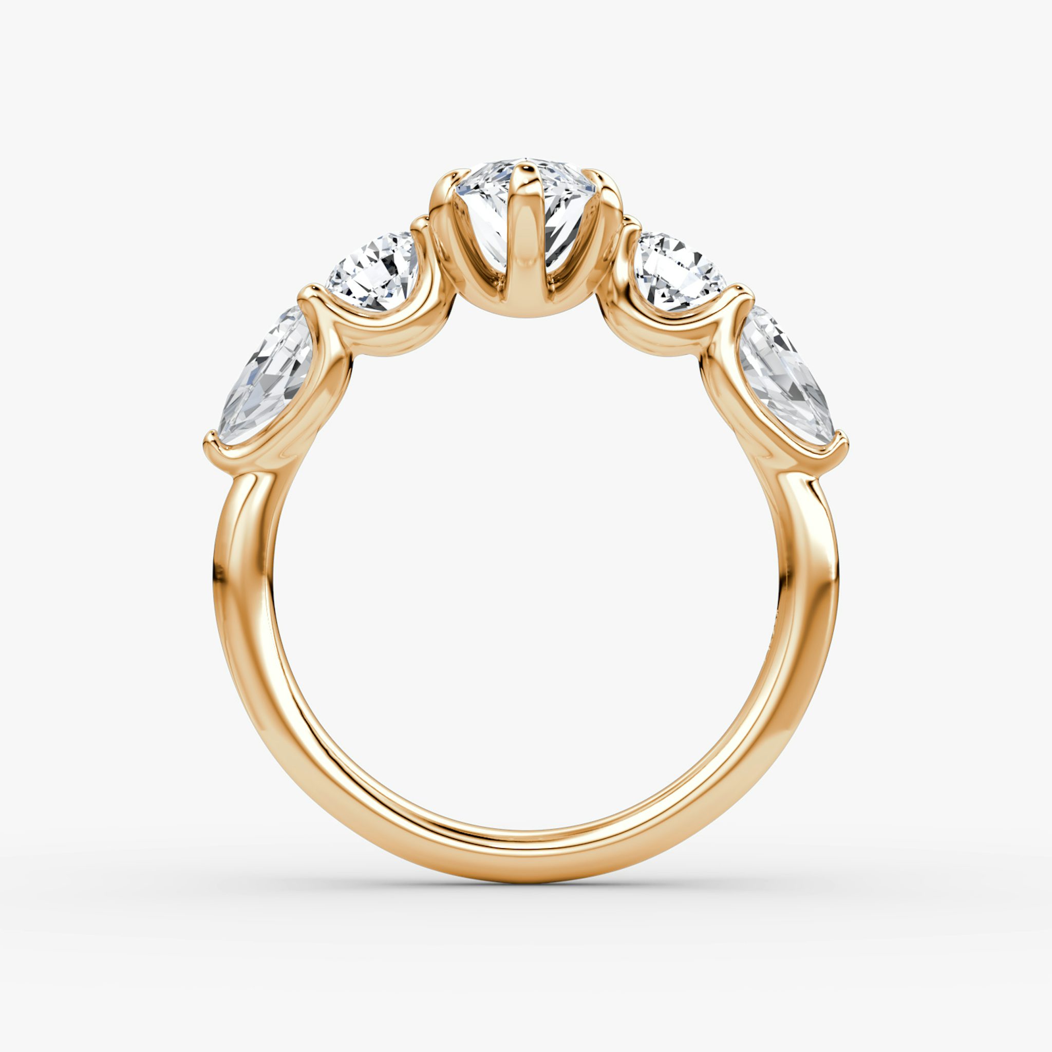The Mixed Shape | Marquise | 14k | Rose Gold | bandAccent: Plain | sideStoneOrientation: horizontal | sideStoneShape: Round Brilliant and Pear | diamondOrientation: vertical | caratWeight: other