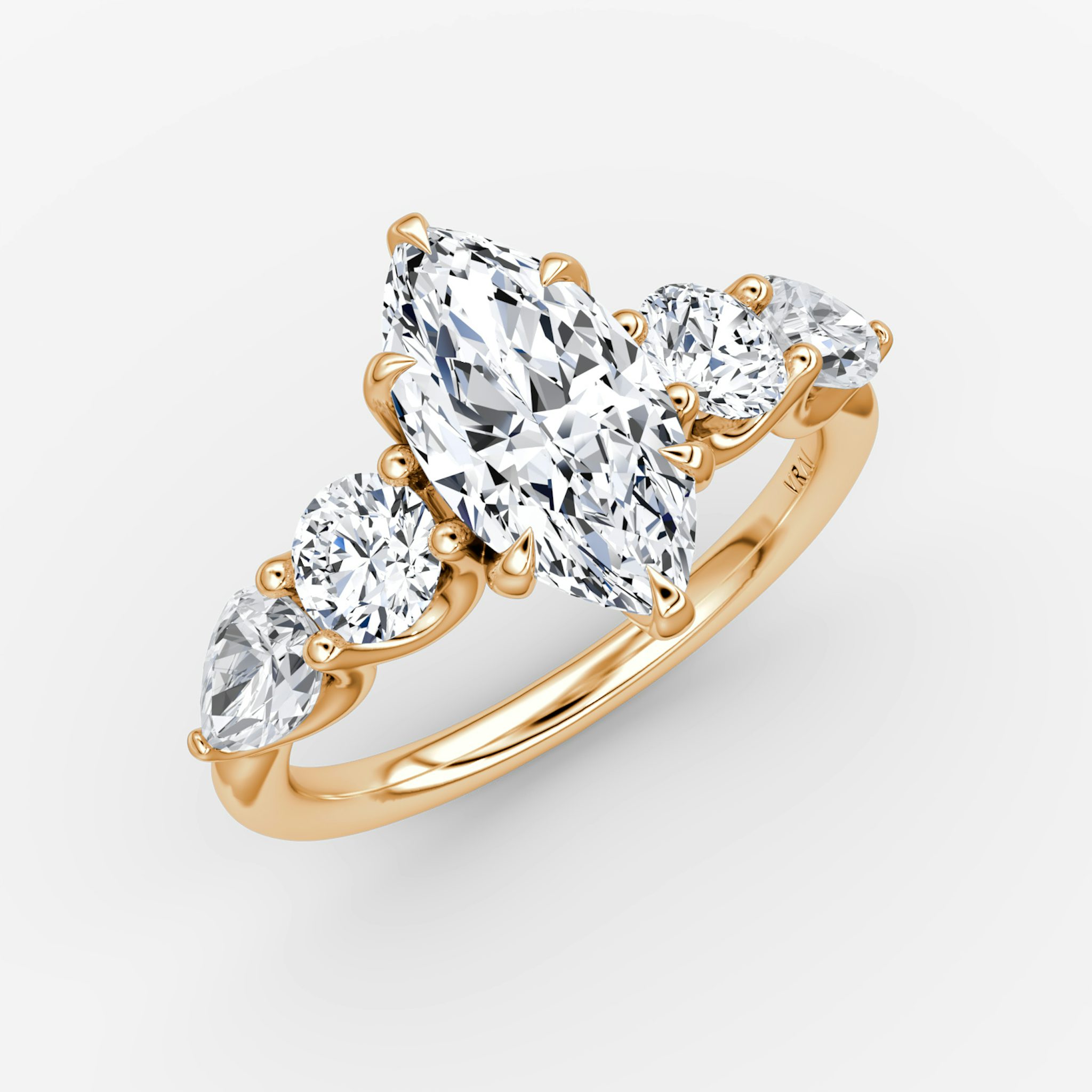 The Mixed Shape | Marquise | 14k | Rose Gold | bandAccent: Plain | sideStoneOrientation: horizontal | sideStoneShape: Round Brilliant and Pear | diamondOrientation: vertical | caratWeight: other