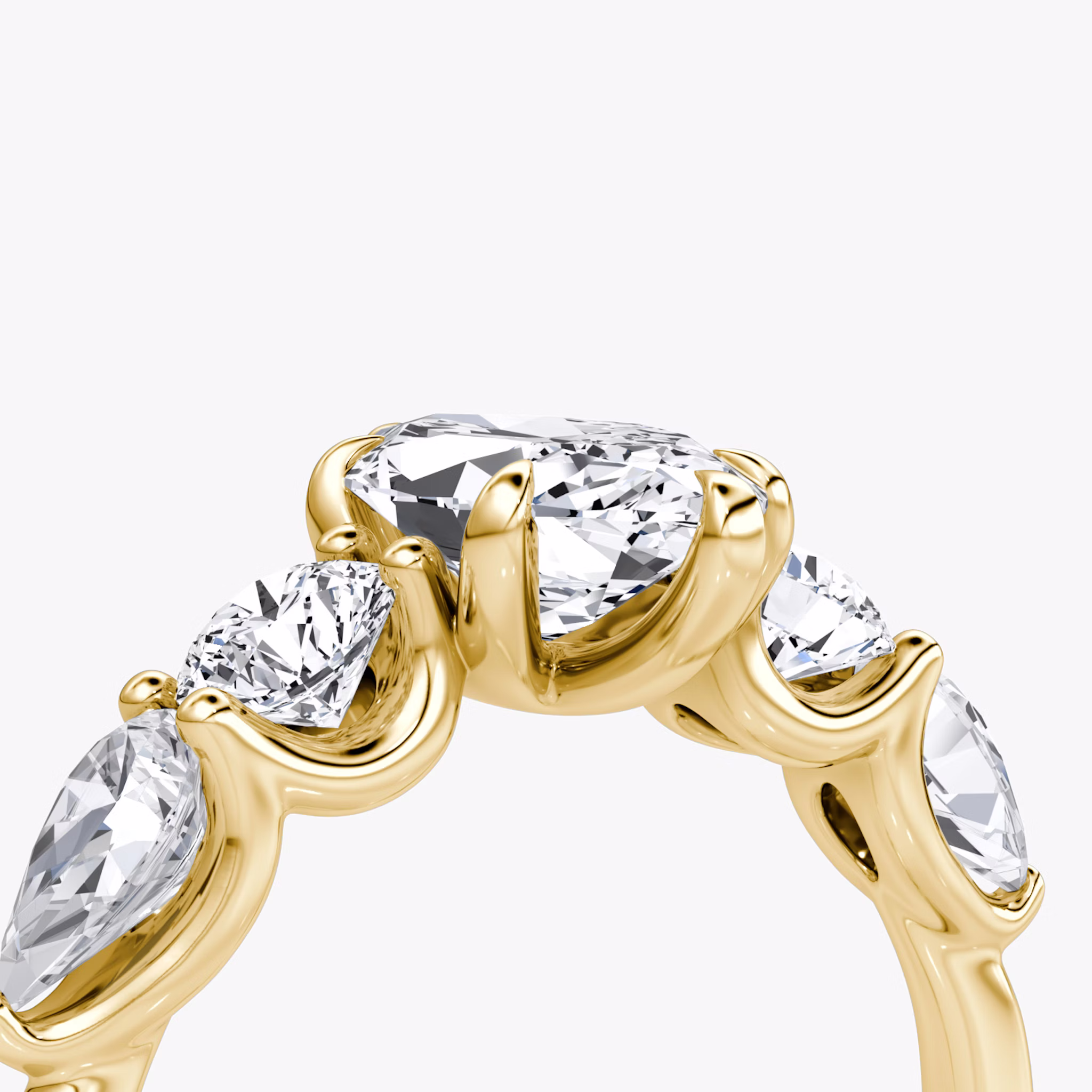 The Mixed Shape | Marquise | 18k | Yellow Gold | bandAccent: Plain | sideStoneOrientation: horizontal | sideStoneShape: Round Brilliant and Pear | diamondOrientation: vertical | caratWeight: other