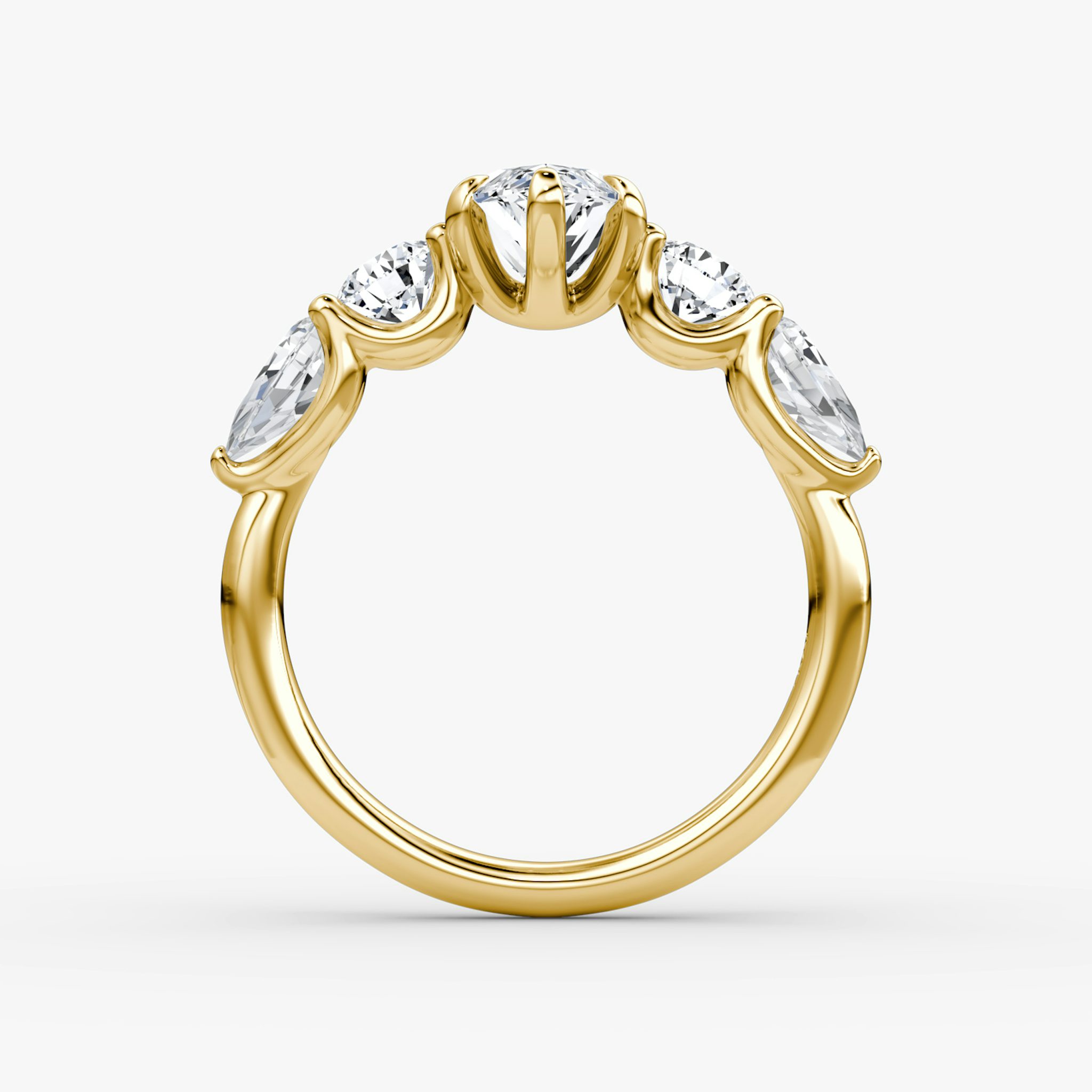 The Mixed Shape | Marquise | 18k | Yellow Gold | bandAccent: Plain | sideStoneOrientation: horizontal | sideStoneShape: Round Brilliant and Pear | diamondOrientation: vertical | caratWeight: other