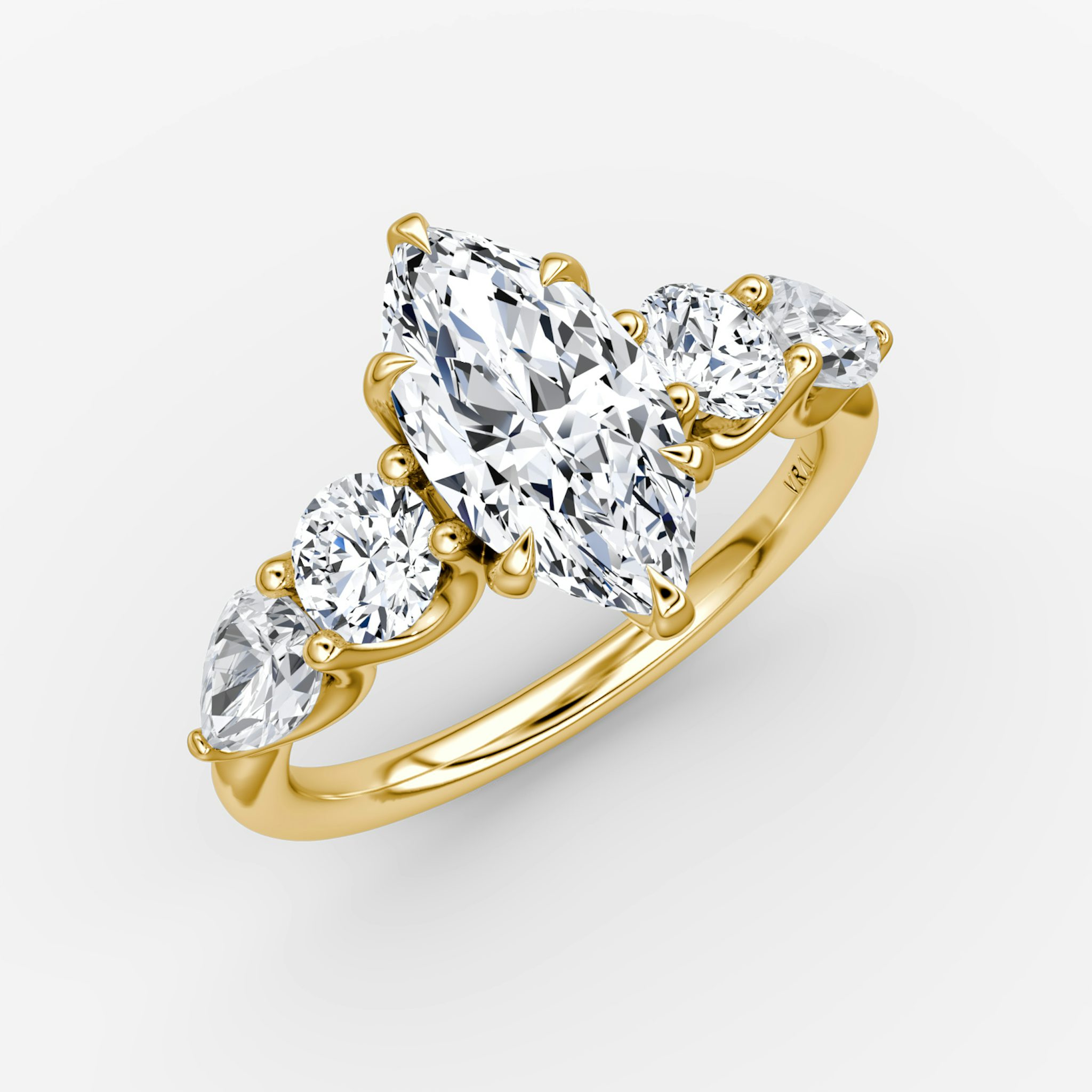 The Mixed Shape | Marquise | 18k | Yellow Gold | bandAccent: Plain | sideStoneOrientation: horizontal | sideStoneShape: Round Brilliant and Pear | diamondOrientation: vertical | caratWeight: other