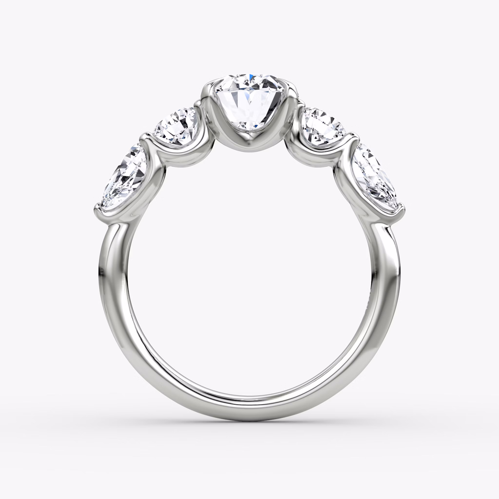 The Mixed Shape | Oval | 18k | White Gold | bandAccent: Plain | sideStoneOrientation: horizontal | sideStoneShape: Round Brilliant and Pear | diamondOrientation: vertical | caratWeight: other