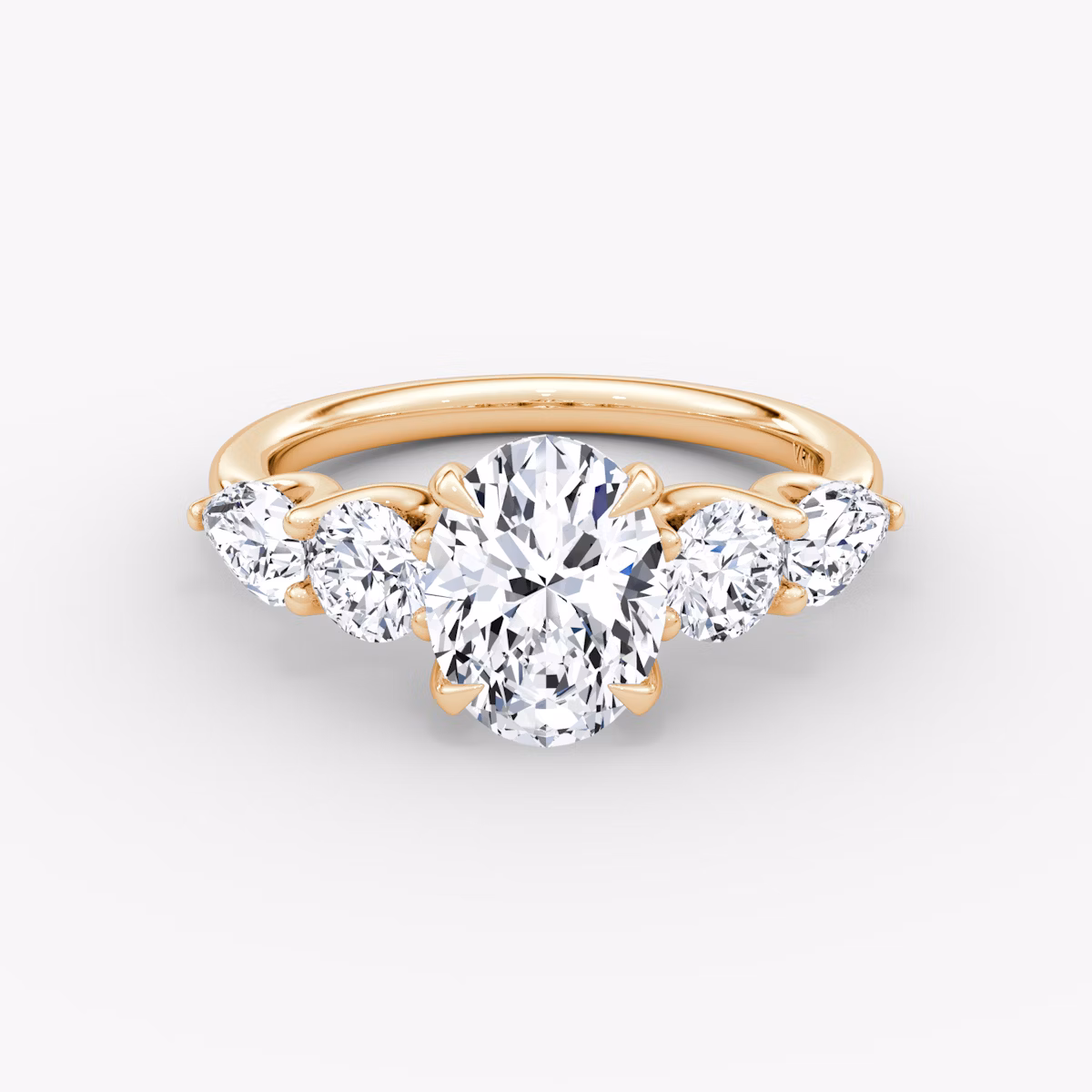 The Mixed Shape | Oval | 14k | Rose Gold | bandAccent: Plain | sideStoneOrientation: horizontal | sideStoneShape: Round Brilliant and Pear | diamondOrientation: vertical | caratWeight: other