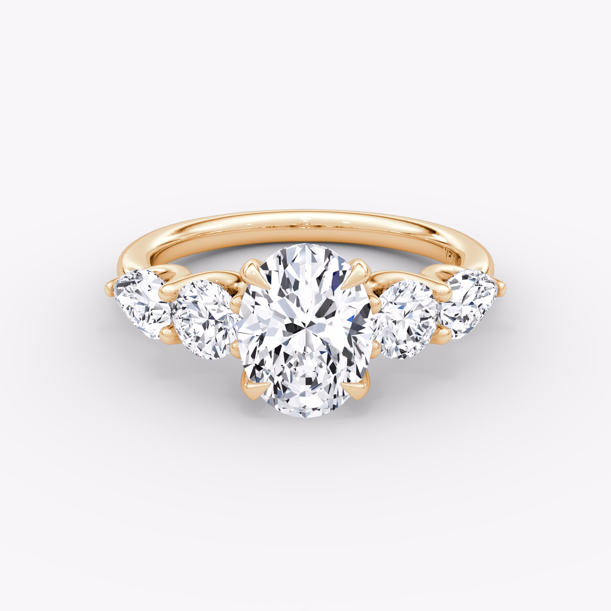 The Mixed Shape | Oval | 14k | Rose Gold | bandAccent: Plain | sideStoneOrientation: horizontal | sideStoneShape: Round Brilliant and Pear | diamondOrientation: vertical | caratWeight: other