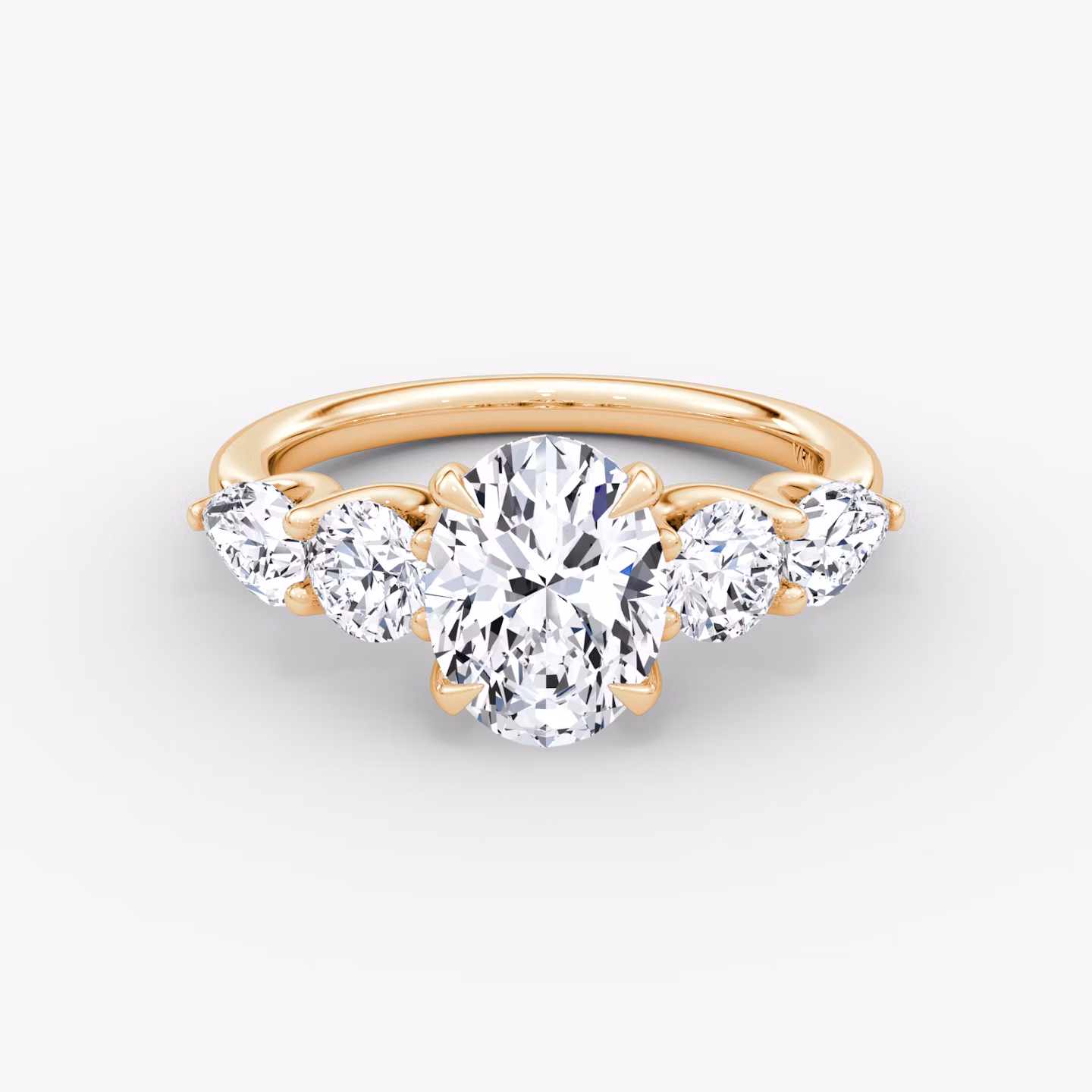 The Mixed Shape | Oval | 14k | Rose Gold | bandAccent: Plain | sideStoneOrientation: horizontal | sideStoneShape: Round Brilliant and Pear | diamondOrientation: vertical | caratWeight: other