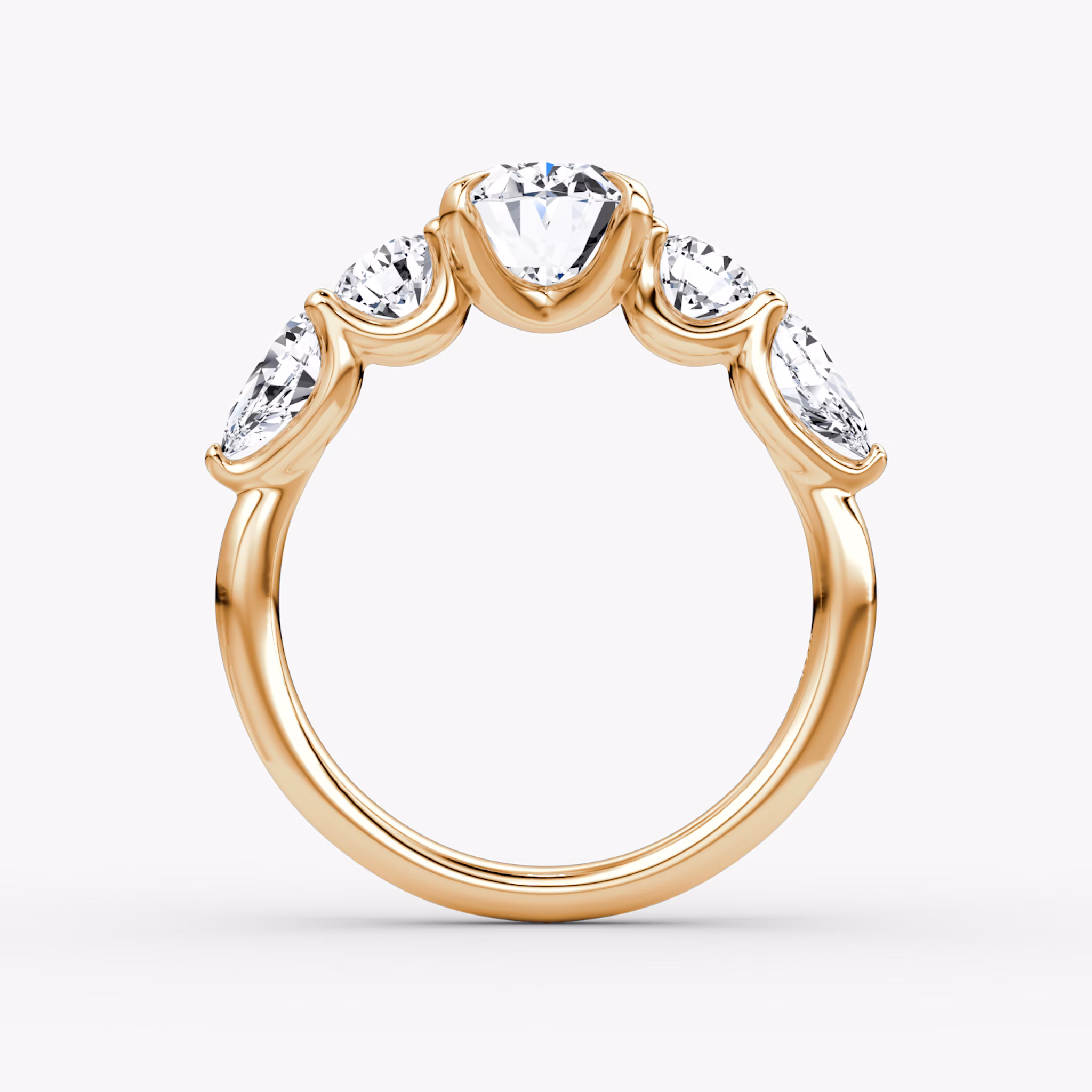 The Mixed Shape | Oval | 14k | Rose Gold | bandAccent: Plain | sideStoneOrientation: horizontal | sideStoneShape: Round Brilliant and Pear | diamondOrientation: vertical | caratWeight: other