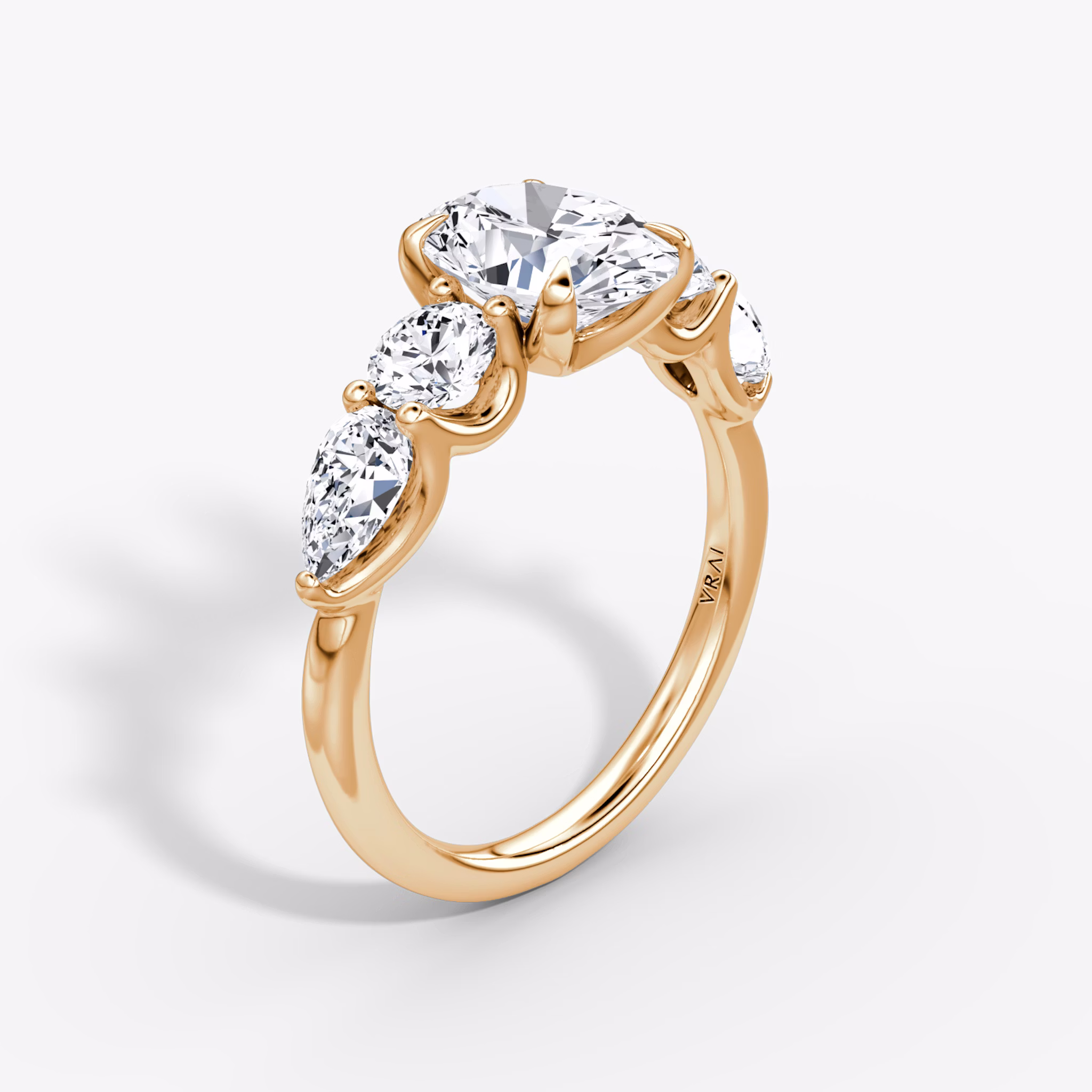 The Mixed Shape | Oval | 14k | Rose Gold | bandAccent: Plain | sideStoneOrientation: horizontal | sideStoneShape: Round Brilliant and Pear | diamondOrientation: vertical | caratWeight: other
