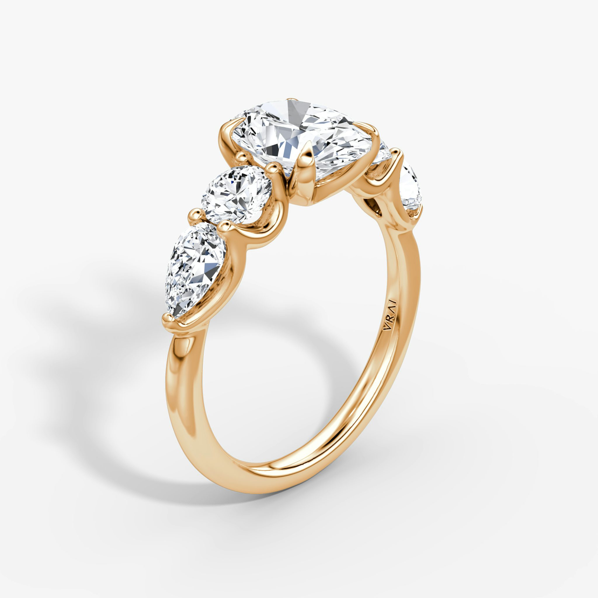 The Mixed Shape | Oval | 14k | Rose Gold | bandAccent: Plain | sideStoneOrientation: horizontal | sideStoneShape: Round Brilliant and Pear | diamondOrientation: vertical | caratWeight: other